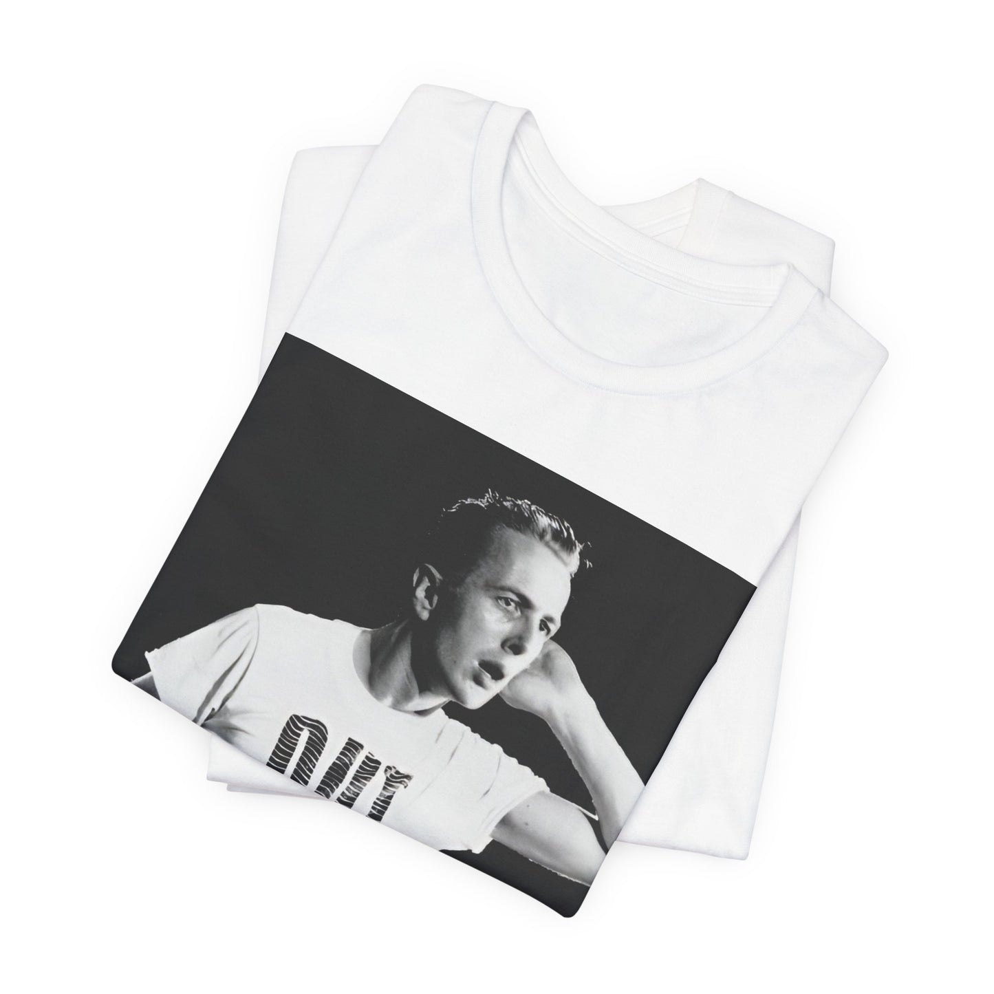 A black graphic t-shirt featuring a black and white graphic or photo portrait of Joe Strummer from The Clash.