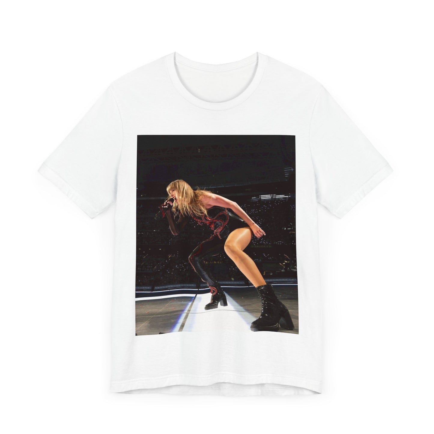 A black graphic t-shirt featuring a fierce graphic of Taylor Swift on stage.