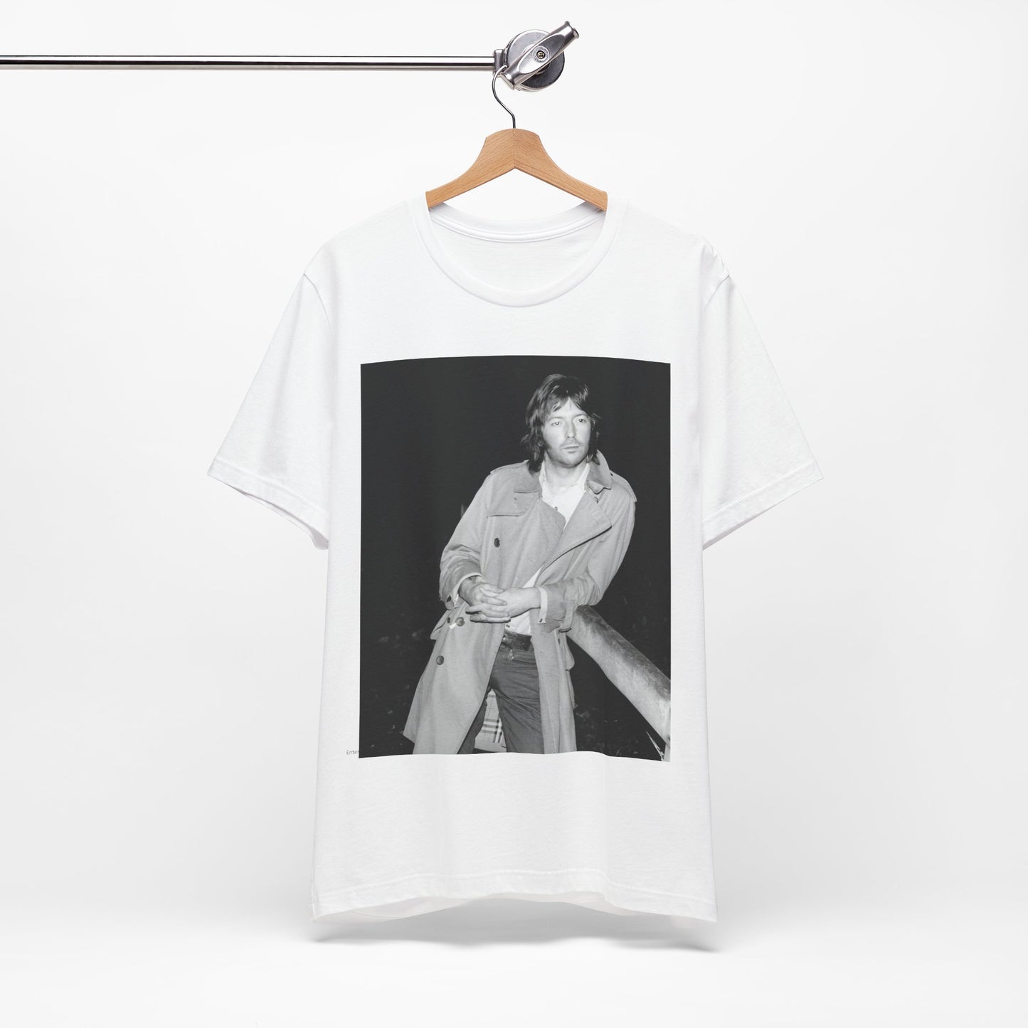 A black graphic t-shirt featuring a retro graphic of Eric Clapton as a blues master.