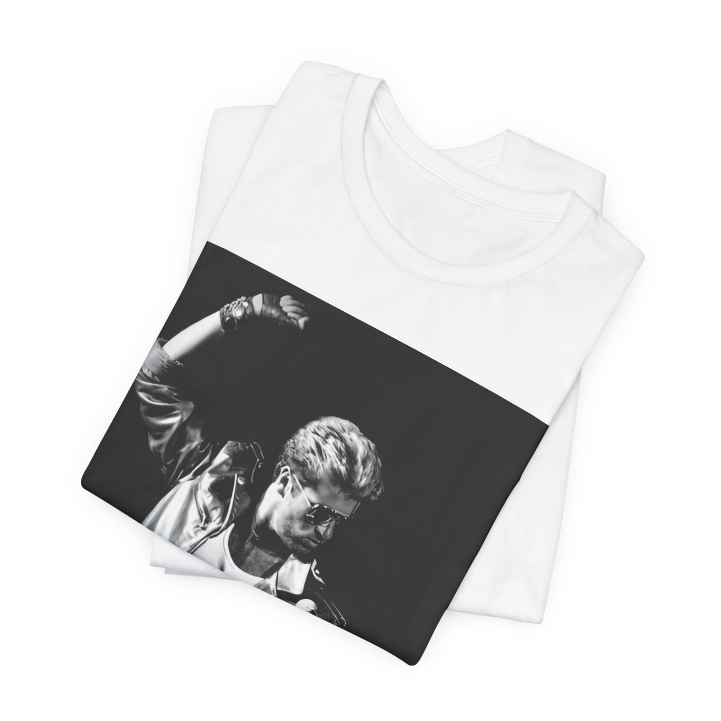 A black graphic t-shirt featuring an iconic black and white portrait photo of George Michael.