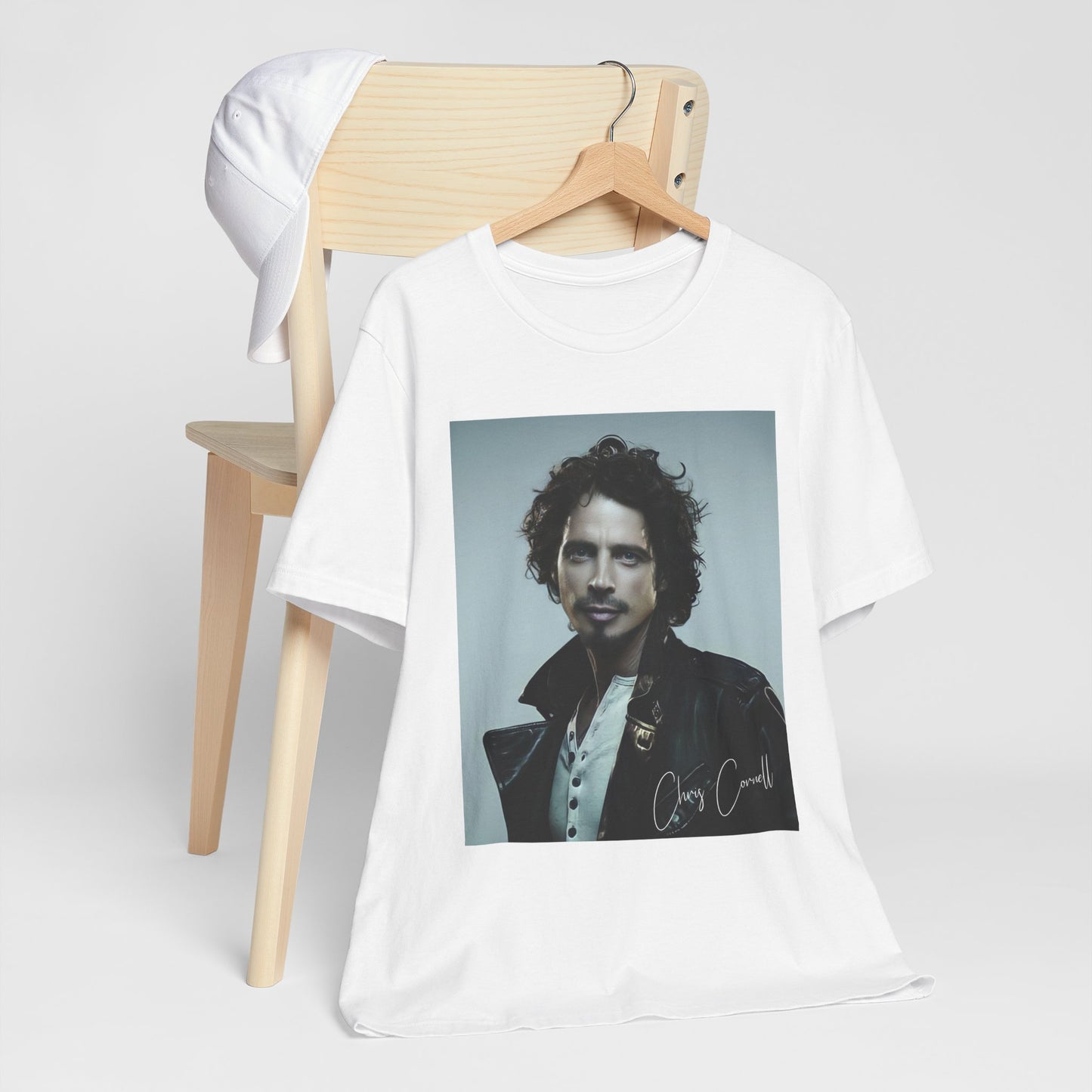 A black graphic t-shirt featuring a graphic related to Chris Cornell's song 'Like a Stone'.