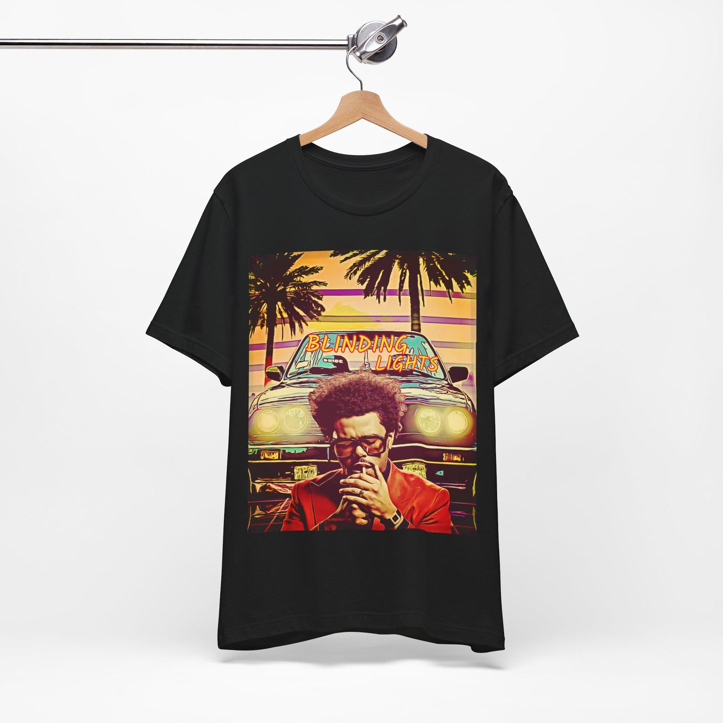 A black graphic t-shirt featuring a graphic related to The Weeknd's 'Blinding Lights' song.