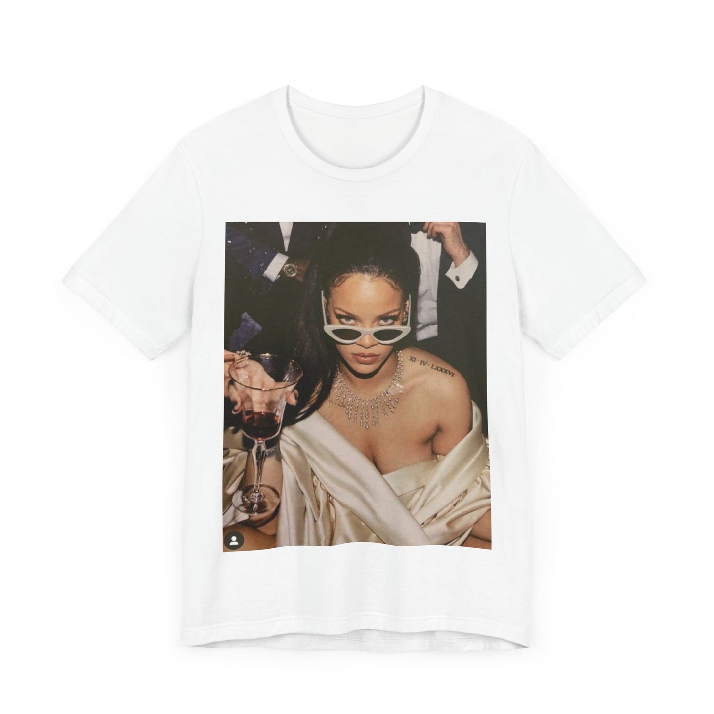 A black graphic t-shirt featuring a graphic of Rihanna as a 'Bad Gal Riri' fashion icon.