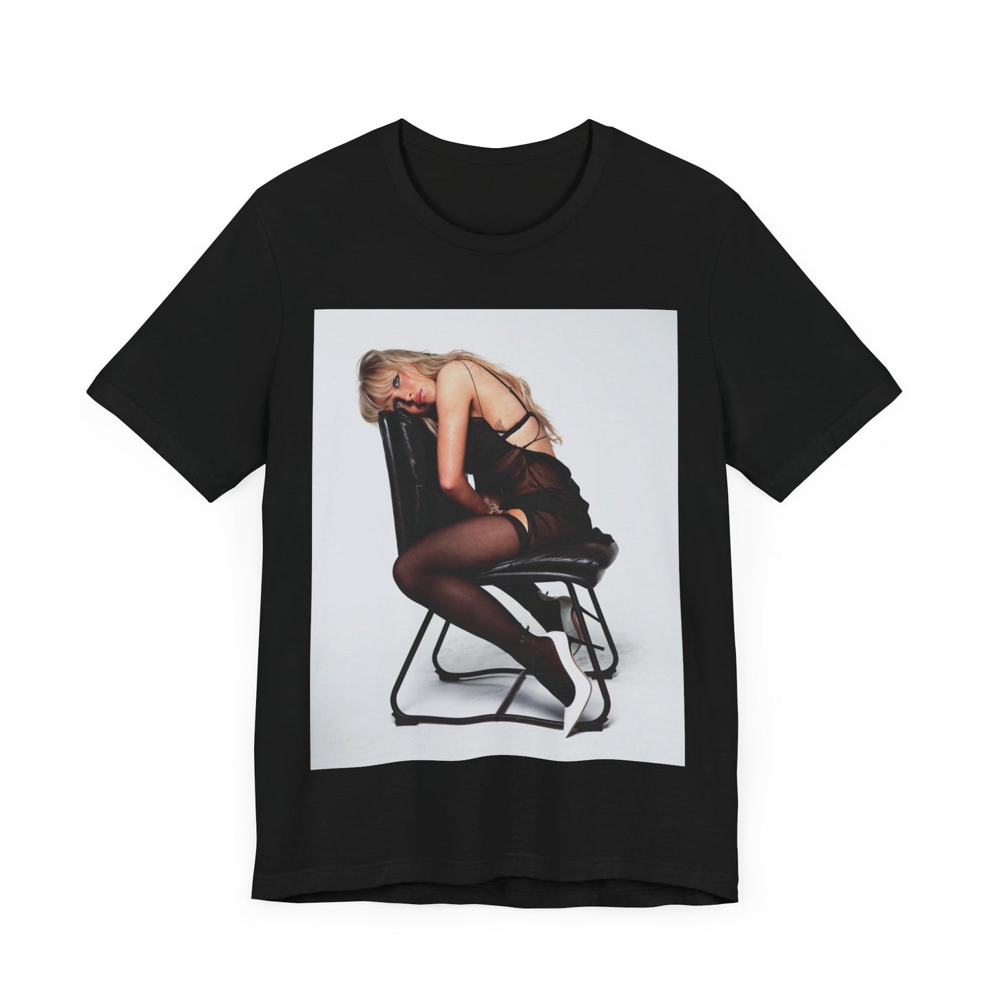 A black graphic t-shirt featuring a playful pop art style graphic of Sabrina Carpenter.
