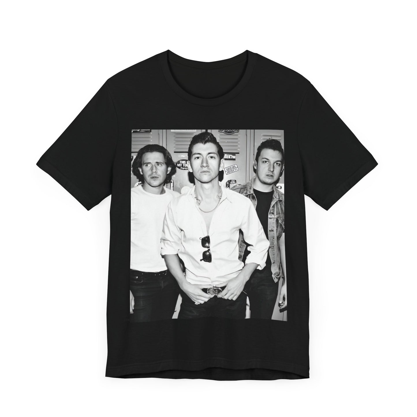 A black graphic t-shirt featuring a vintage-style design related to Arctic Monkeys' 'AM' album era, possibly with the album art or band imagery.