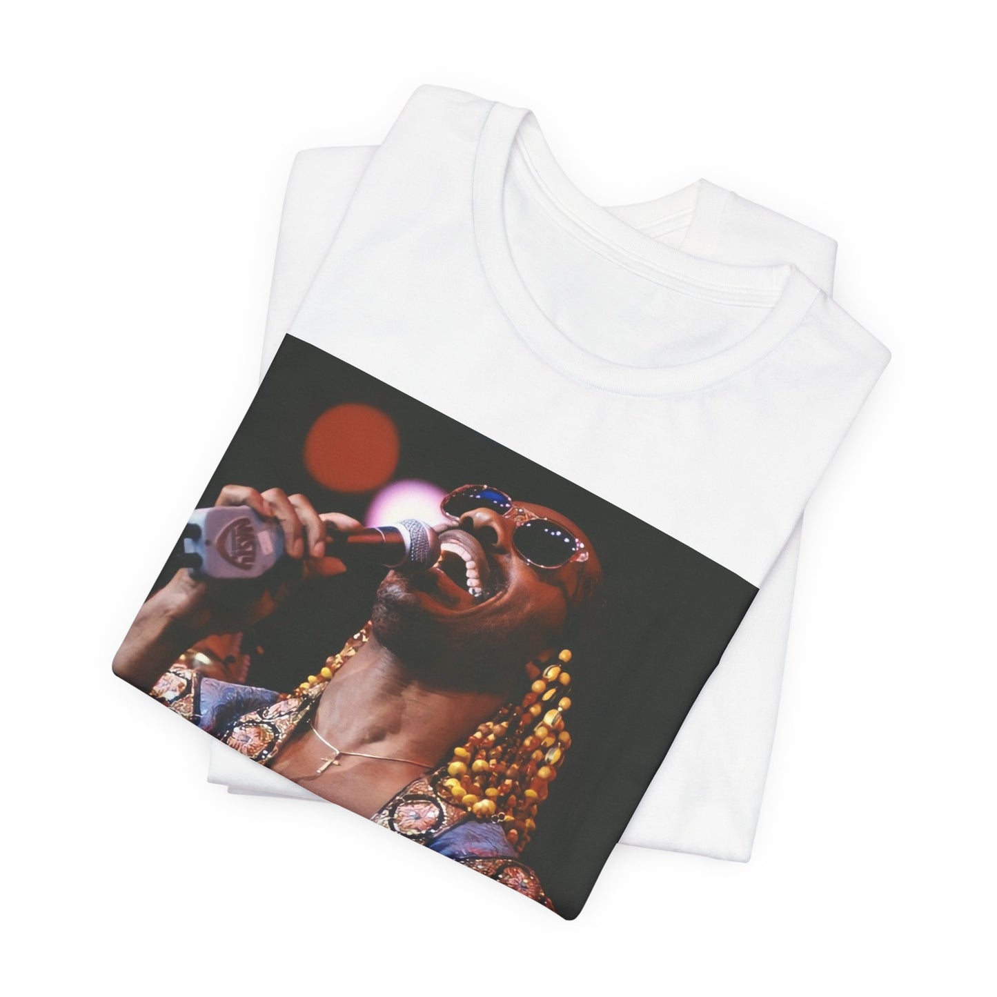A black graphic t-shirt featuring a 70s vintage soul icon graphic of Stevie Wonder.