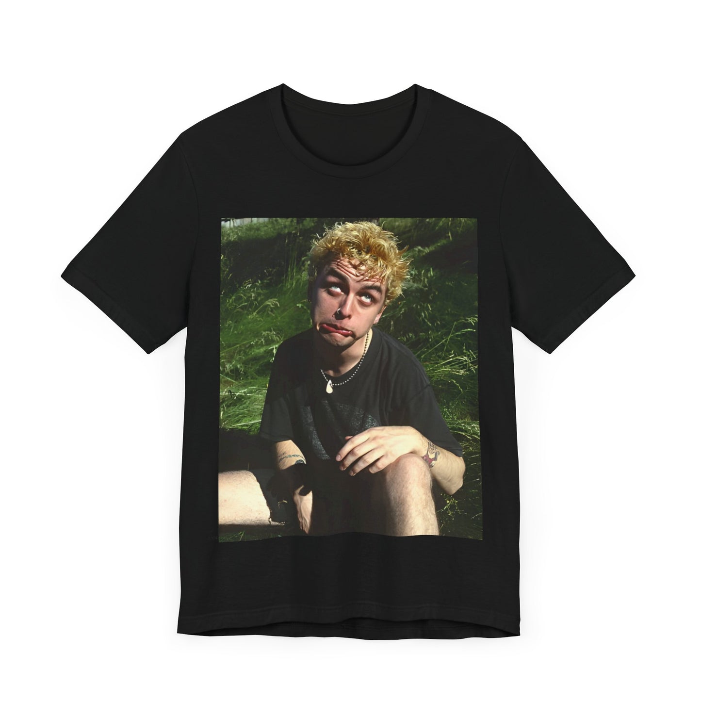 A black graphic t-shirt featuring a 90s graphic of Billie Joe Armstrong from Green Day.