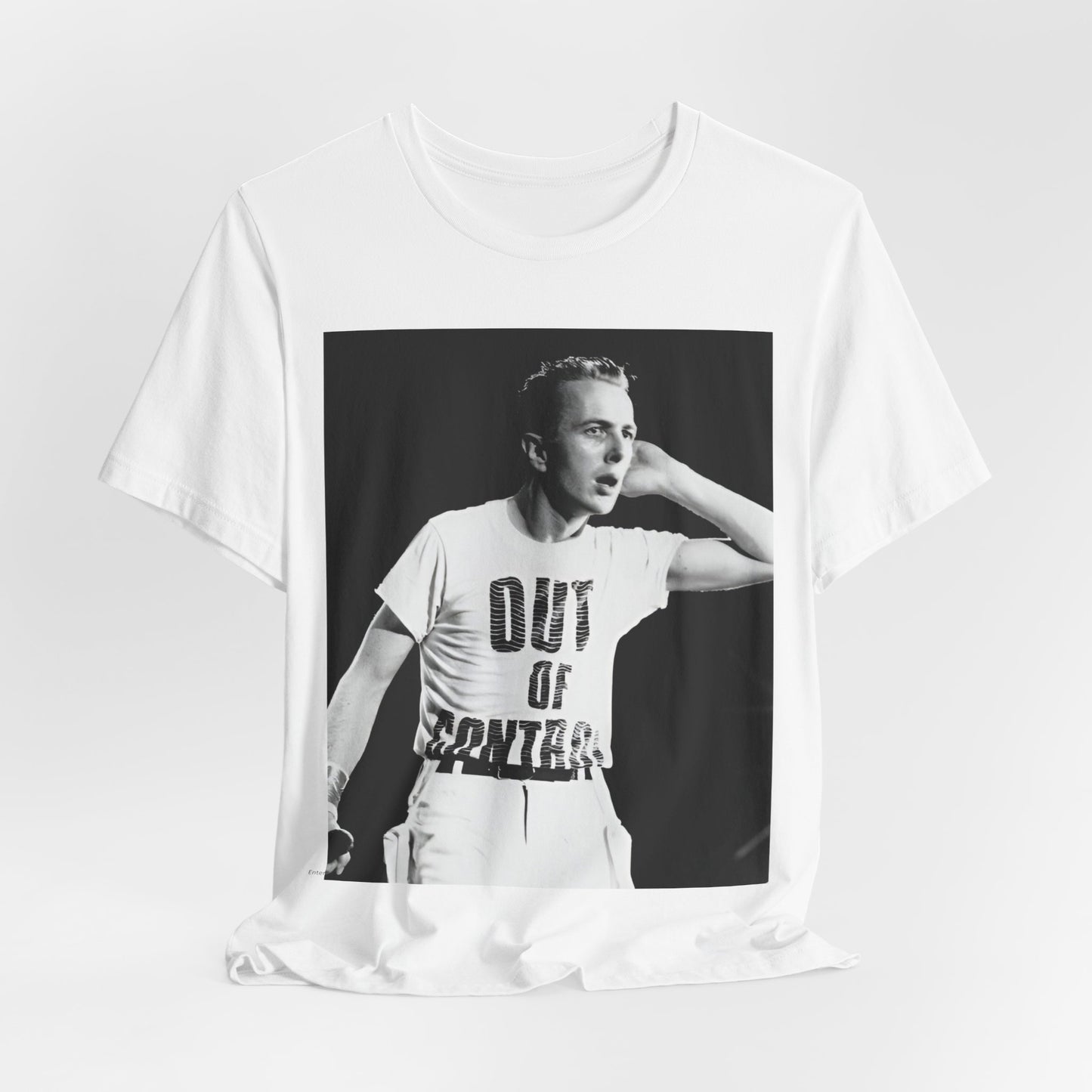 A black graphic t-shirt featuring a black and white graphic or photo portrait of Joe Strummer from The Clash.