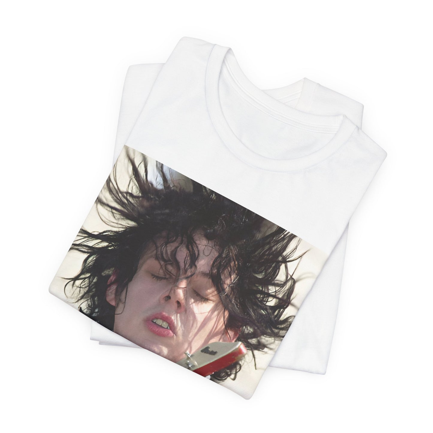 A black graphic t-shirt featuring a retro graphic of Jack White from The White Stripes playing guitar.