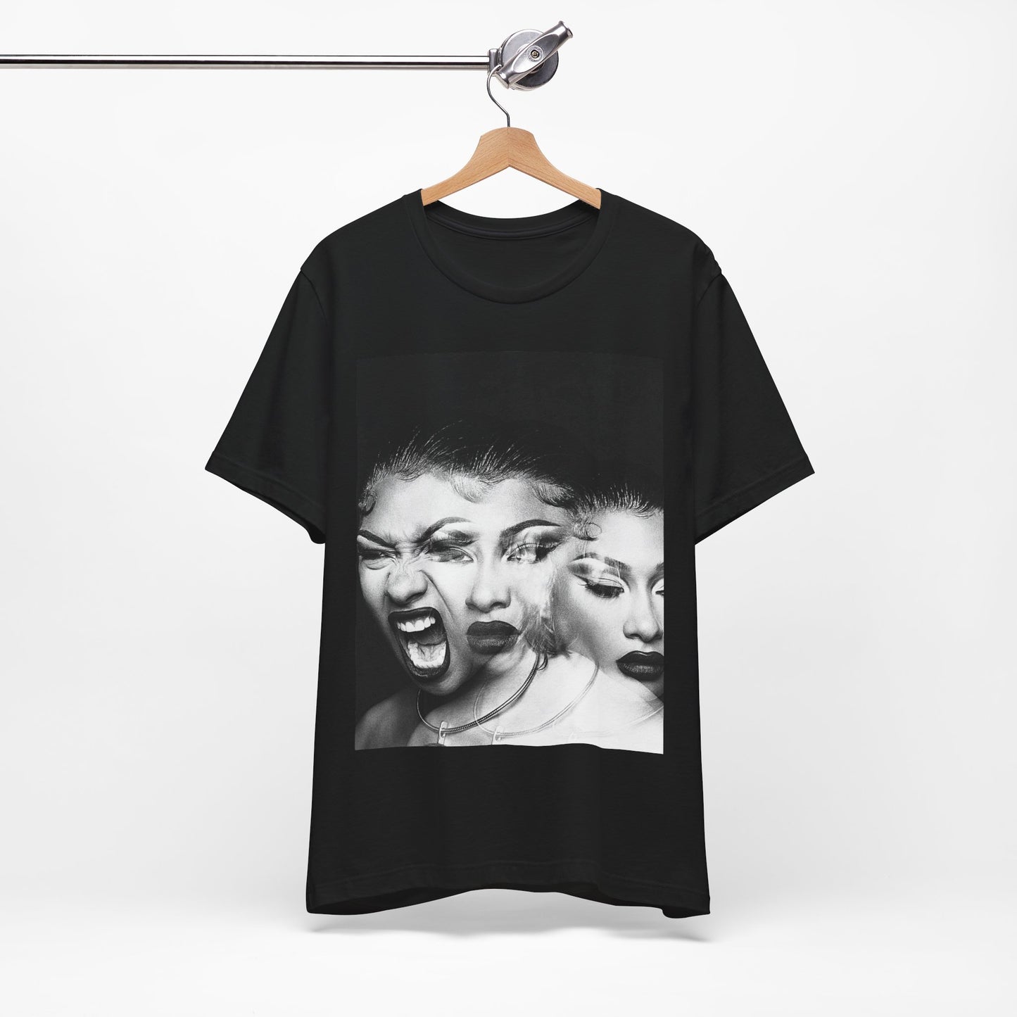 A black graphic t-shirt featuring a graphic related to Megan Thee Stallion's 'Traumazine' album.