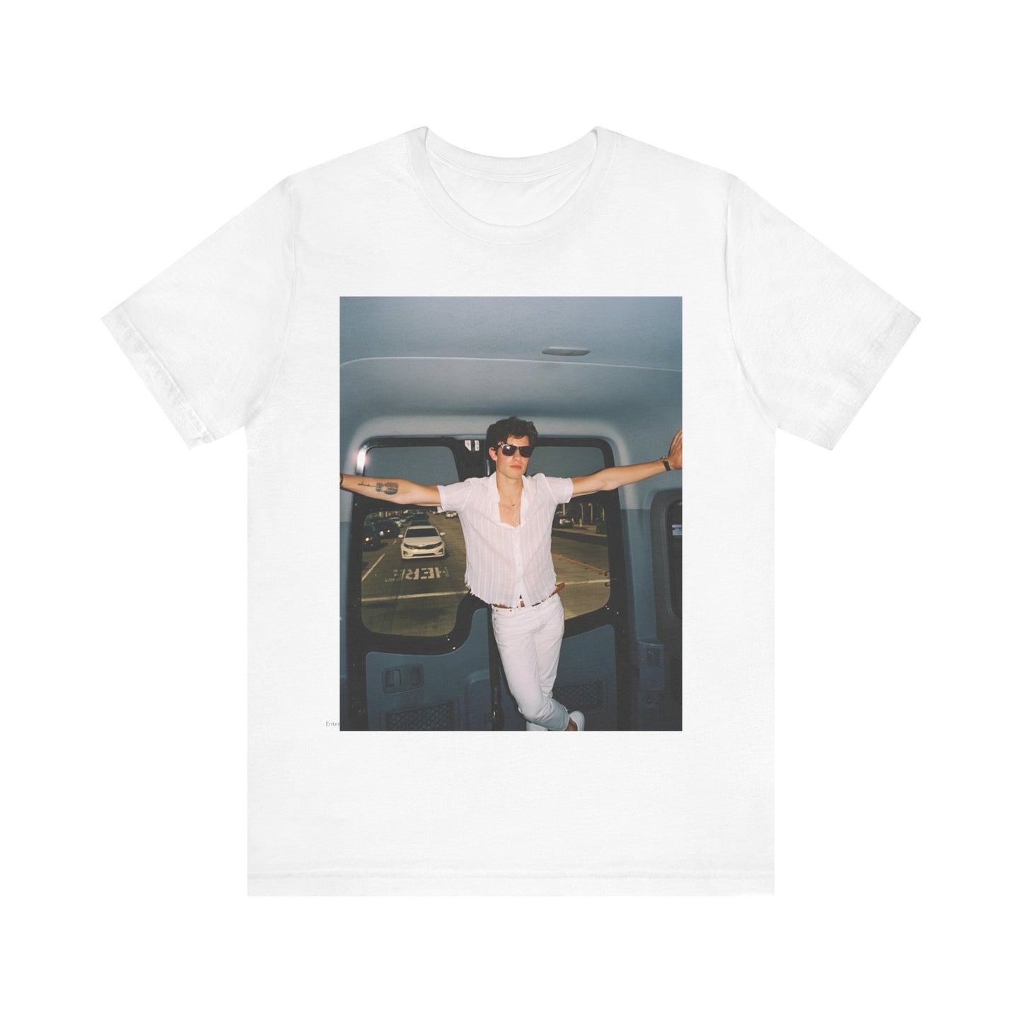 A black graphic t-shirt featuring a graphic of Shawn Mendes with a classic confident look.