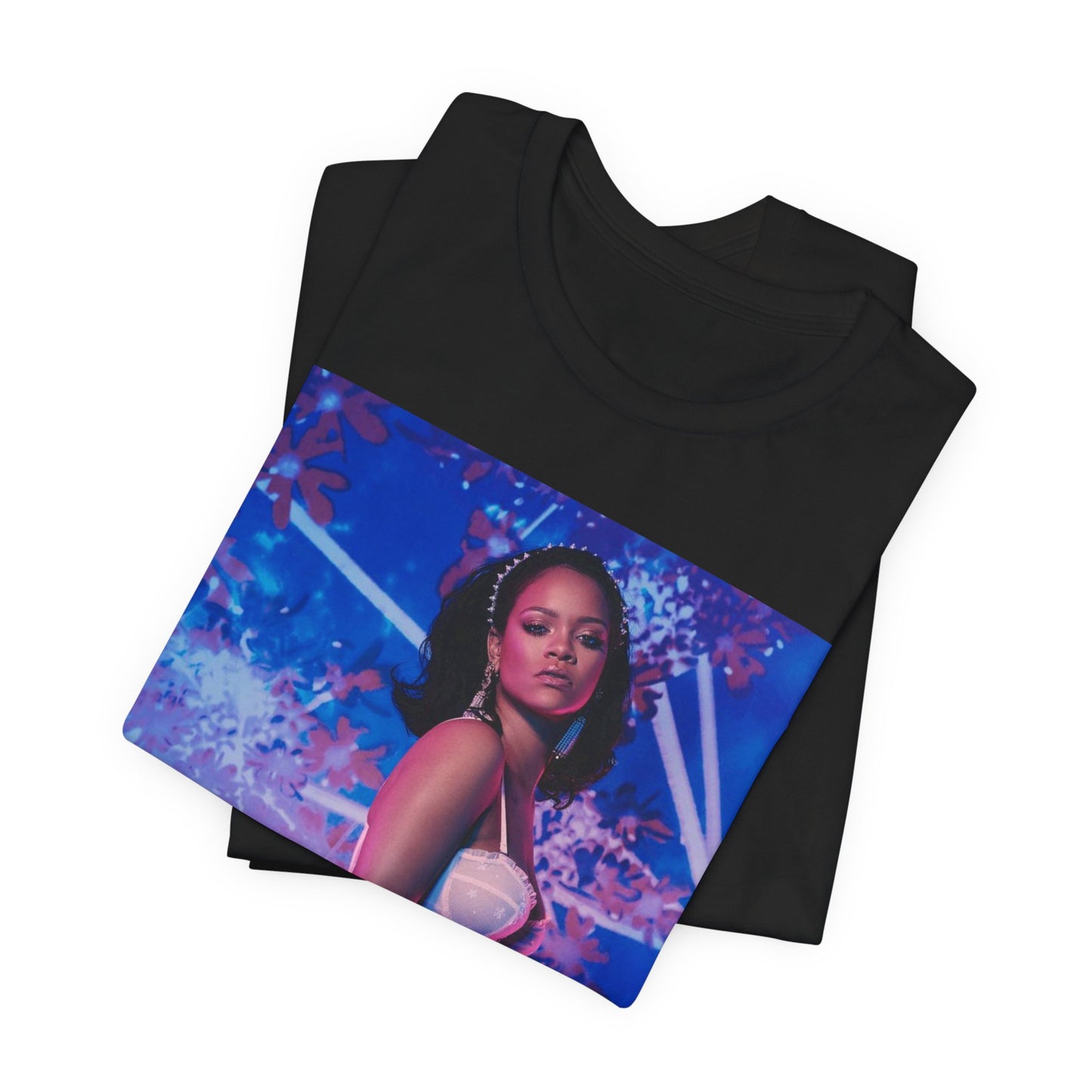 A black graphic t-shirt featuring a graphic of Rihanna as a lingerie goddess.