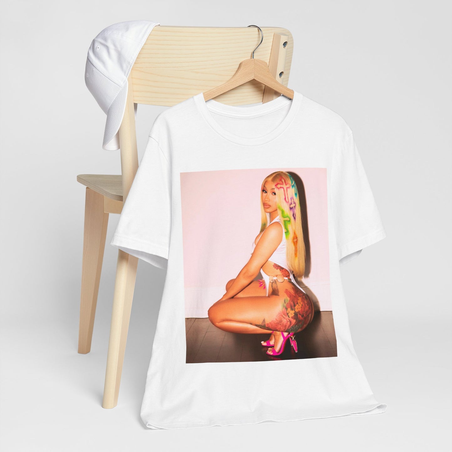 A black graphic t-shirt featuring a graphic of Cardi B in a bold, fashion-forward pose, emphasizing her 'fashion killa' style.