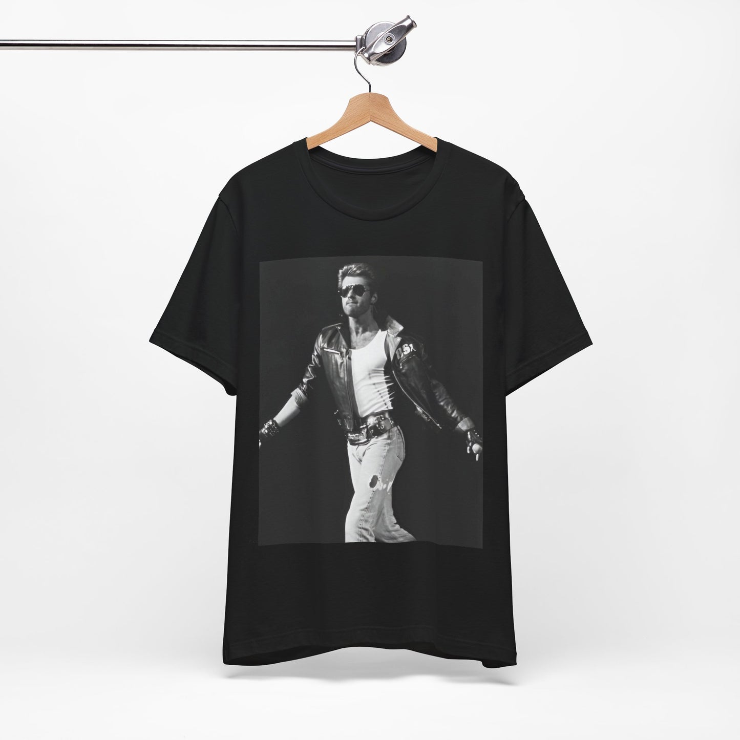 A black graphic t-shirt featuring a retro black and white monochrome graphic or photo of George Michael.