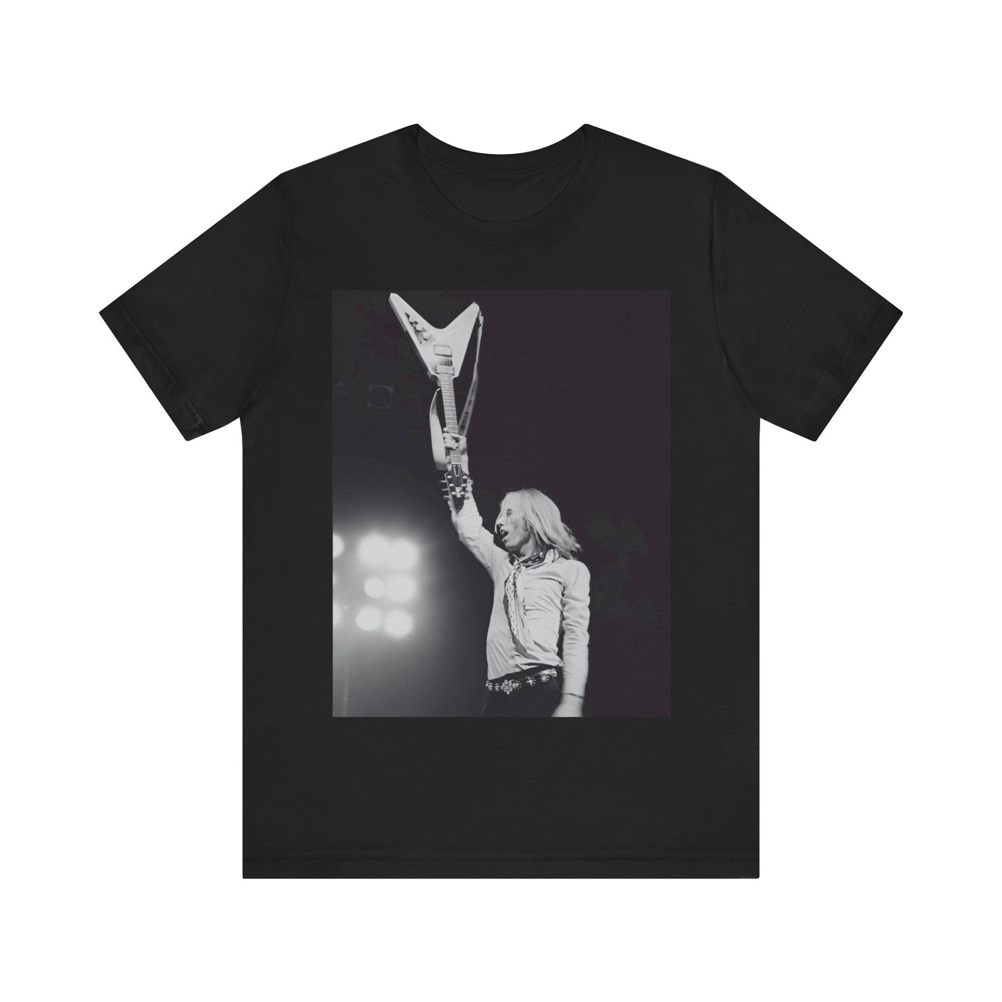 A black graphic t-shirt featuring a graphic or photo of Tom Petty playing guitar on stage.