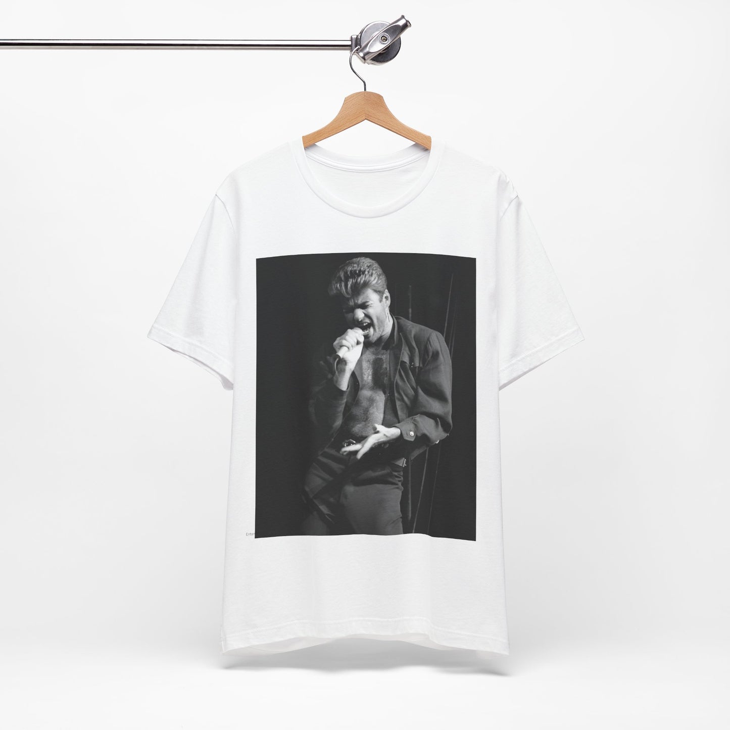 A black graphic t-shirt featuring a glamorous photo or graphic of George Michael performing live.