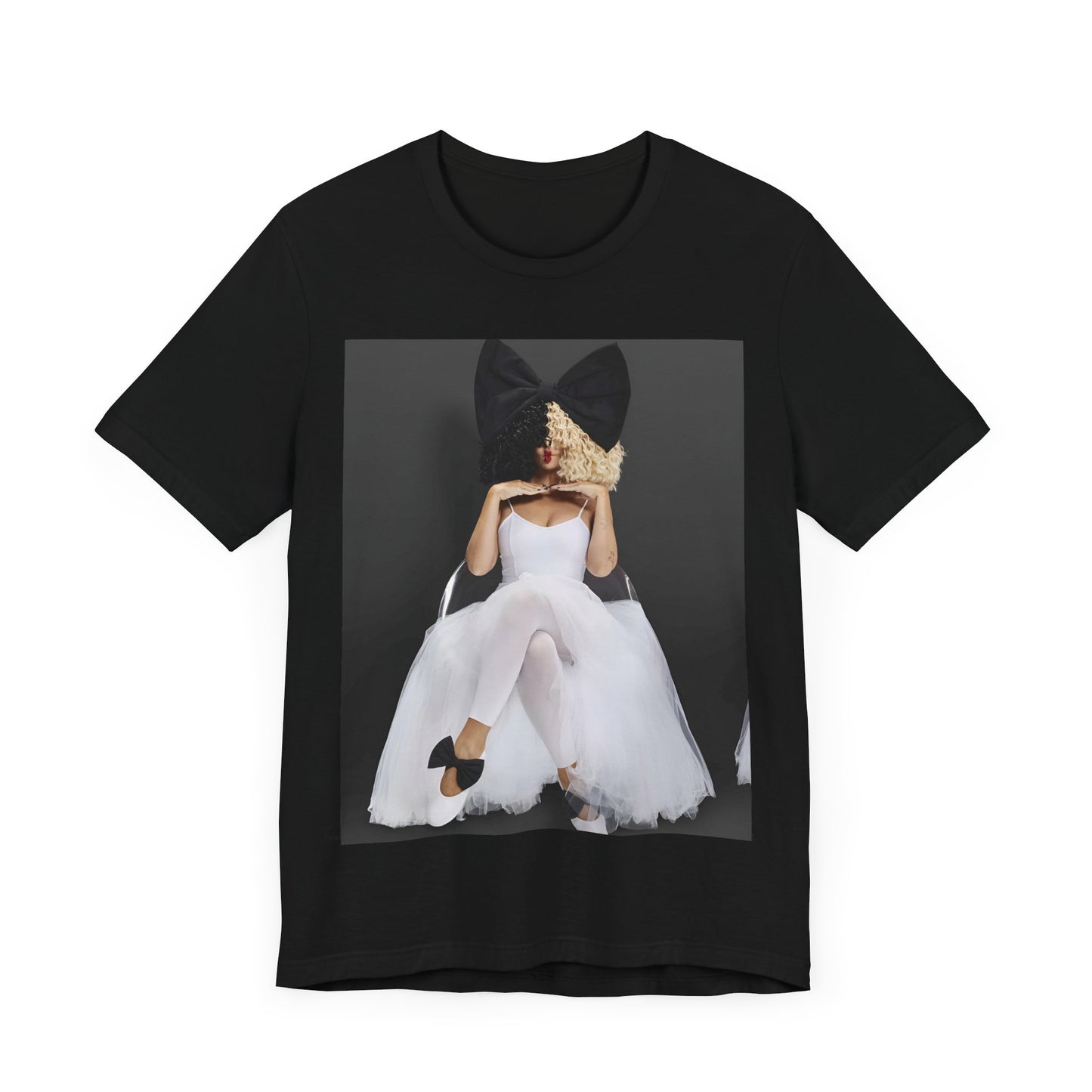 A black graphic t-shirt featuring a graphic of Sia's iconic wig style.
