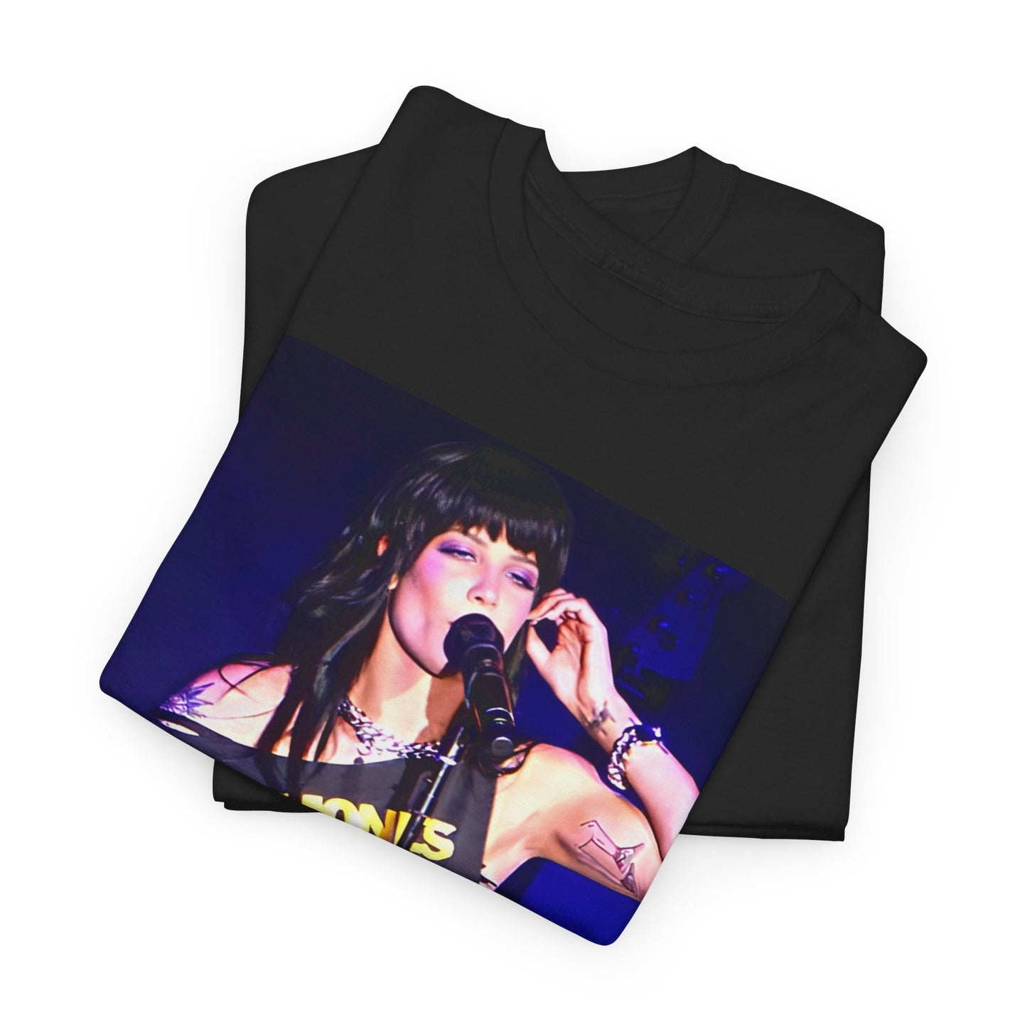 A black graphic t-shirt featuring a vintage graphic of Halsey as a pop rebel on stage.