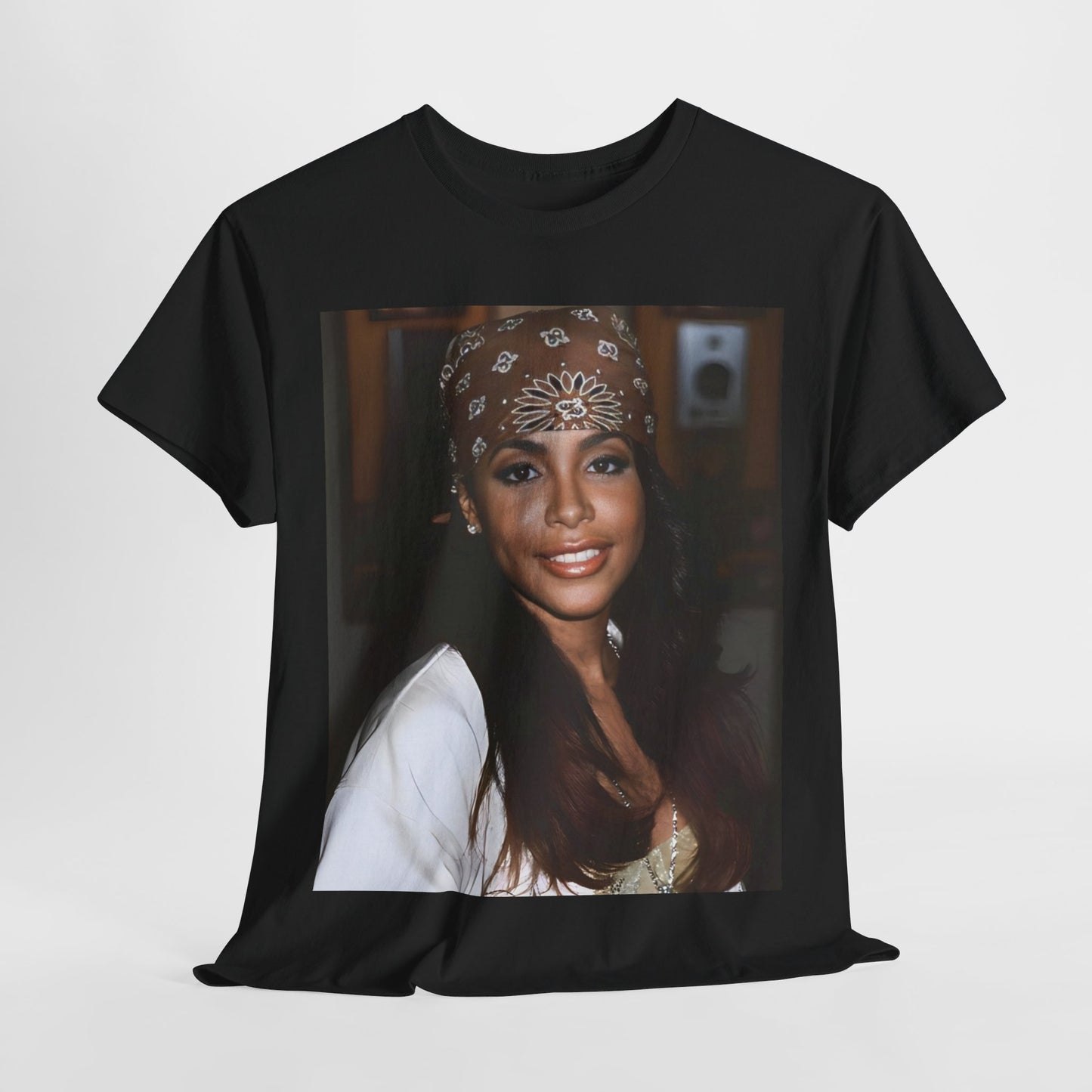 A black graphic t-shirt featuring a graphic of Aaliyah as the queen of modern R&B.