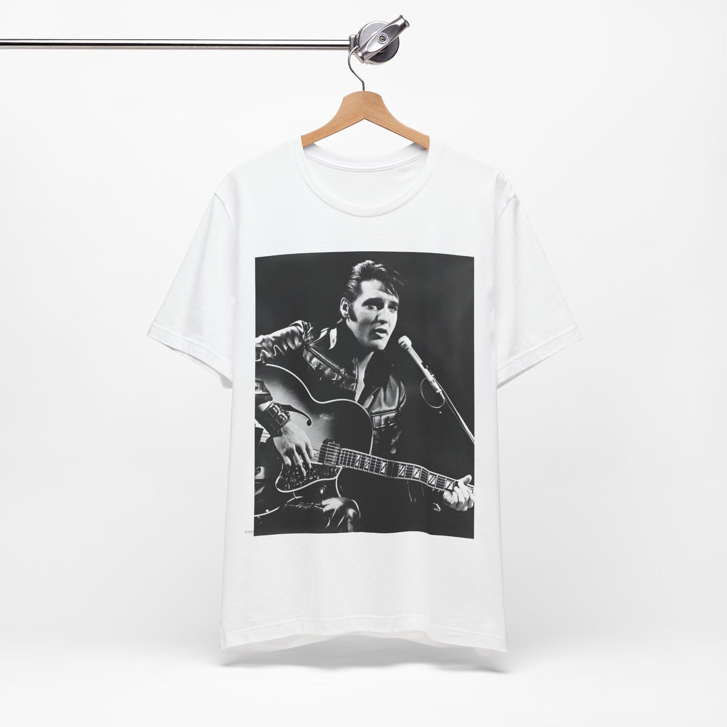 A black graphic t-shirt featuring a graphic related to Elvis Presley's 'Burning Love' song or era.