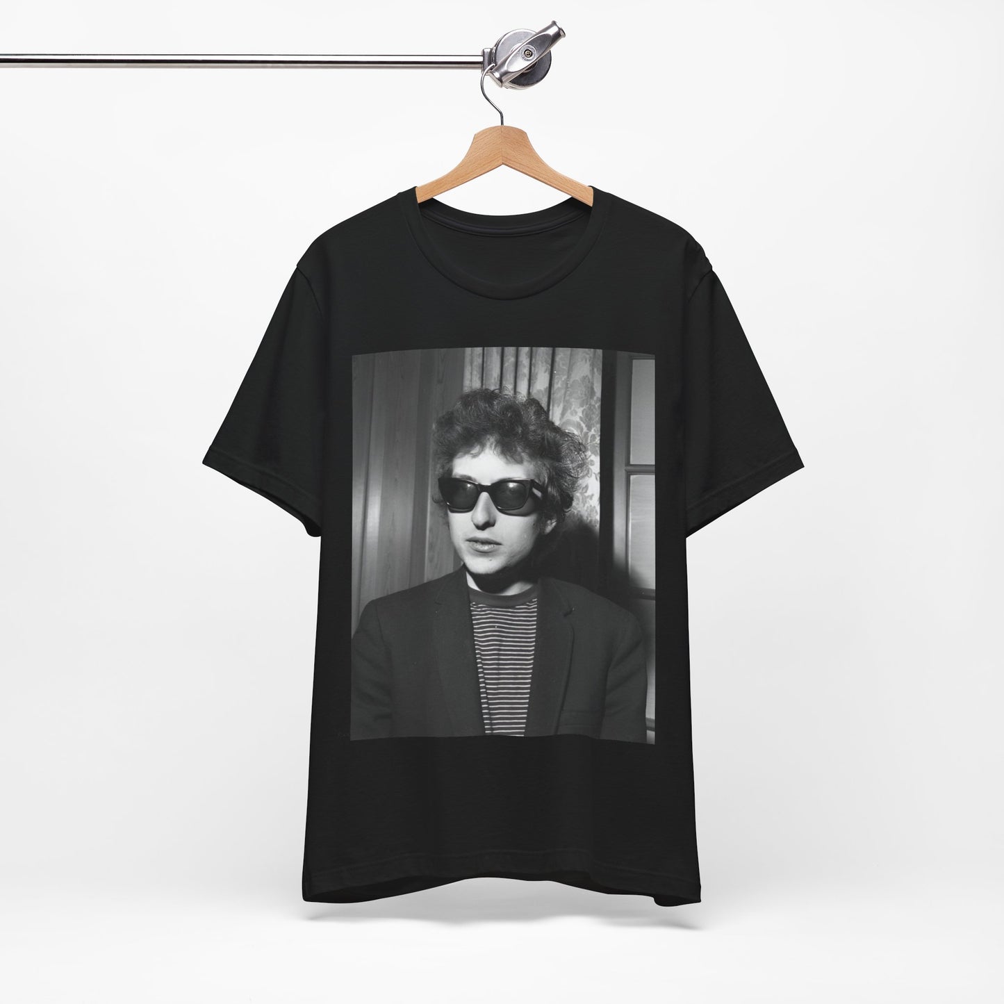 A black graphic t-shirt featuring a graphic related to Bob Dylan's 'The Freewheelin' album era.
