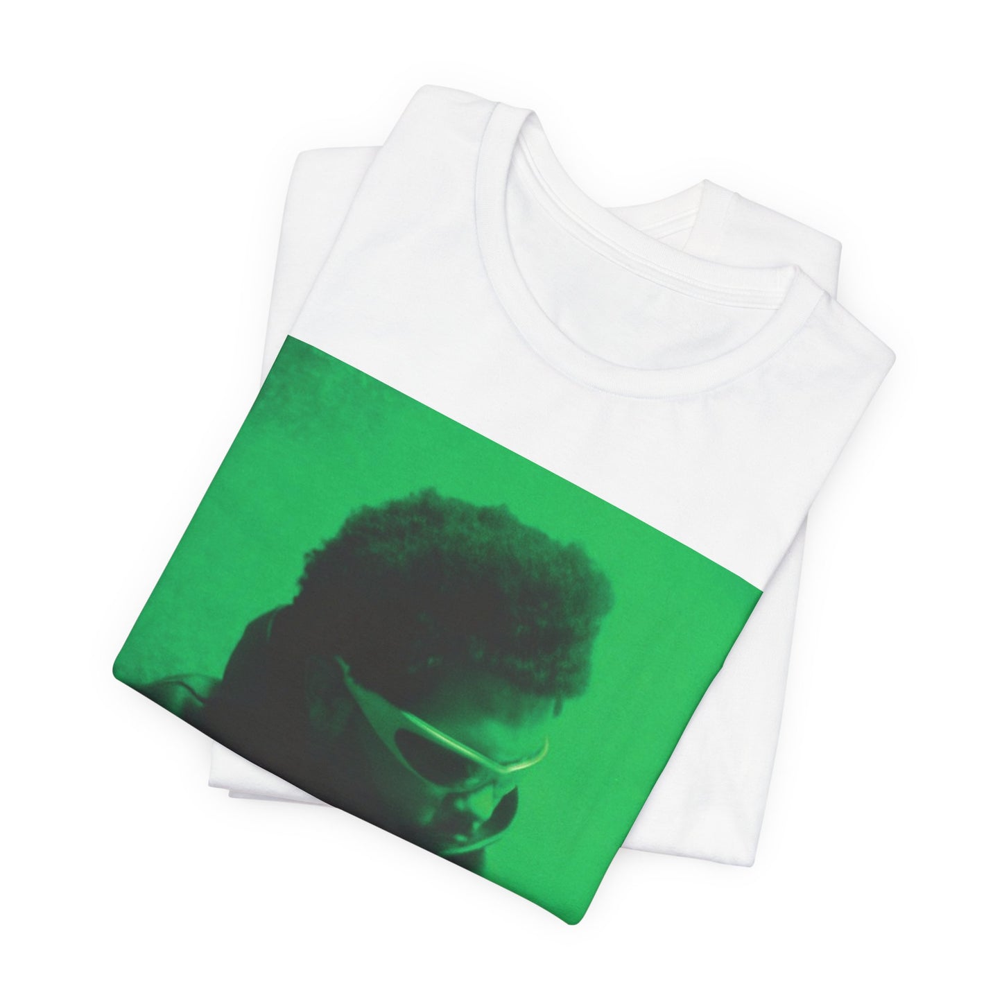 A black graphic t-shirt featuring a vintage graphic related to The Weeknd's 'Kiss Land' era.