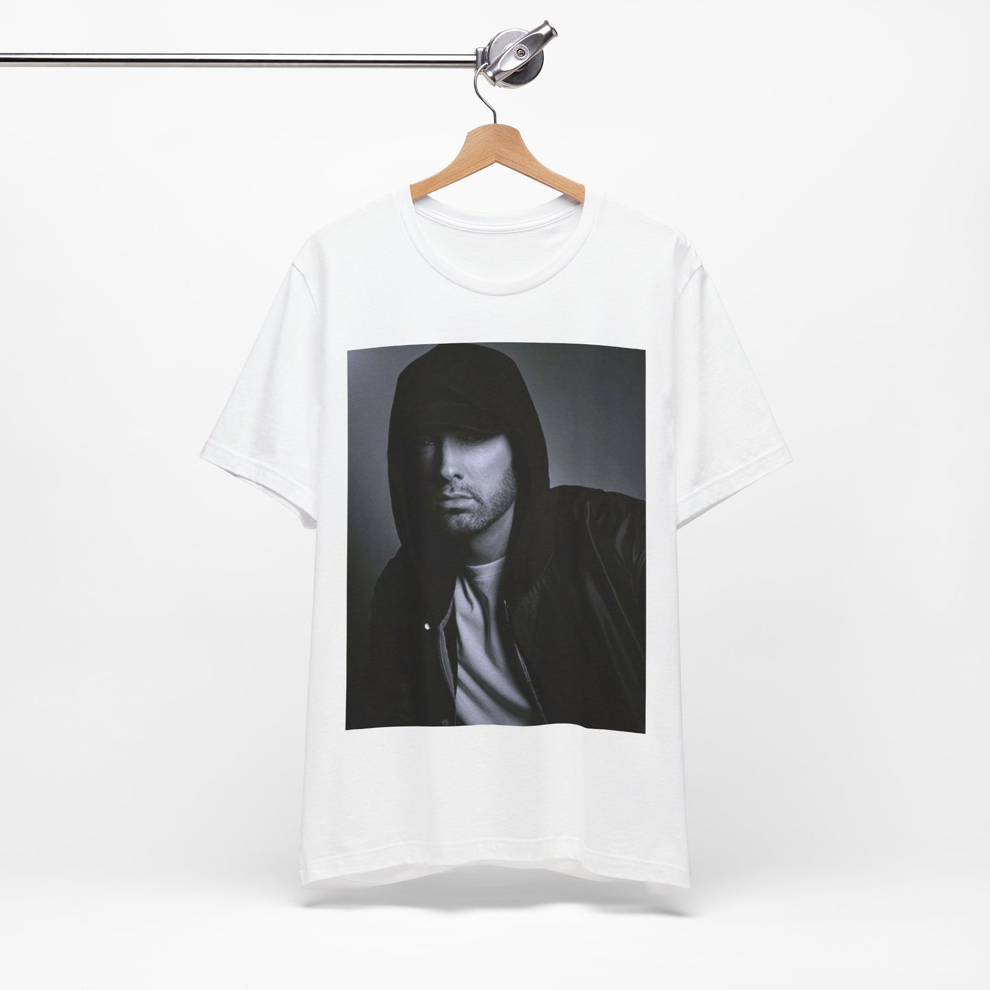 A black graphic t-shirt featuring a black and white, monochrome graphic or photo of Eminem.