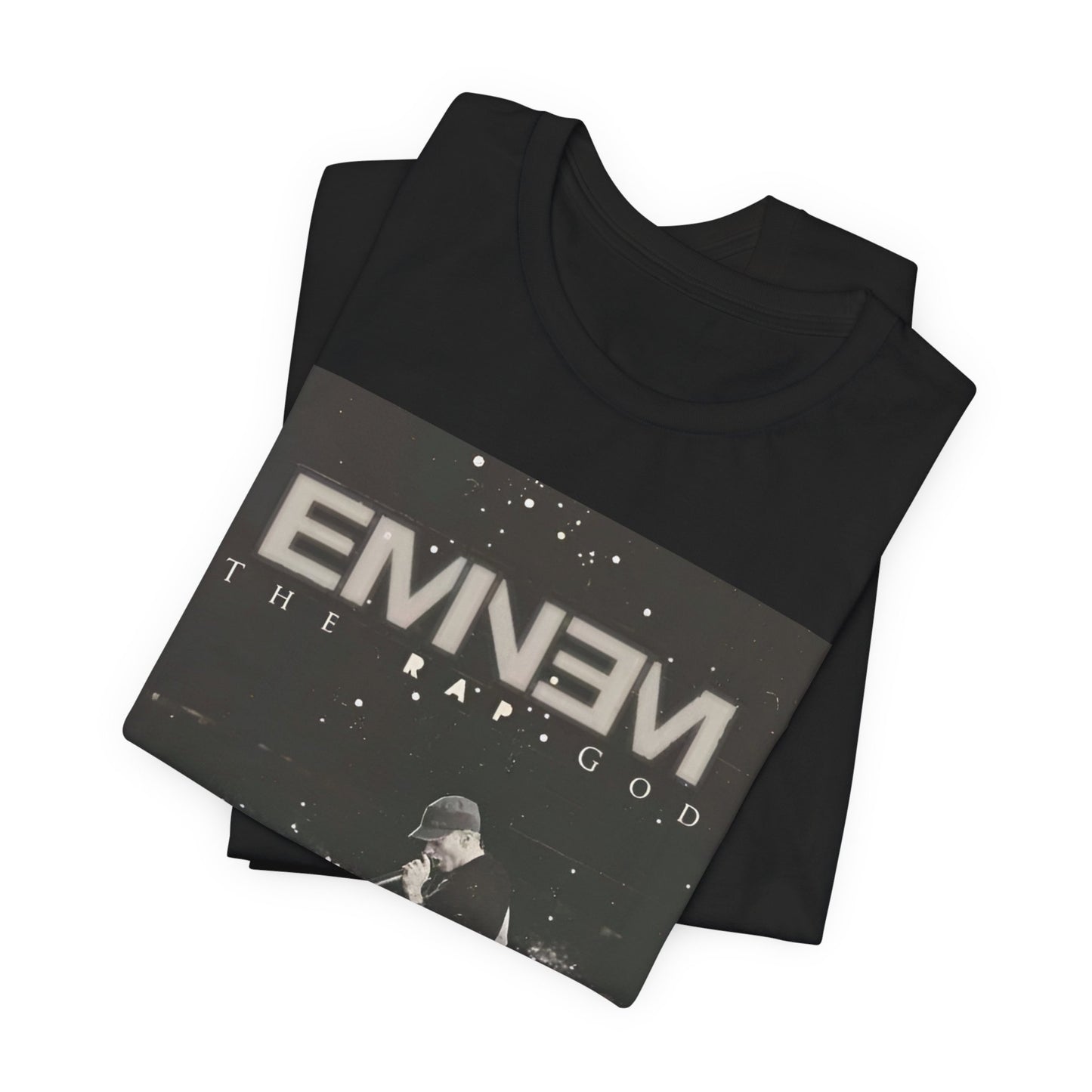 A black graphic t-shirt featuring a graphic or photo of Eminem performing live on tour.