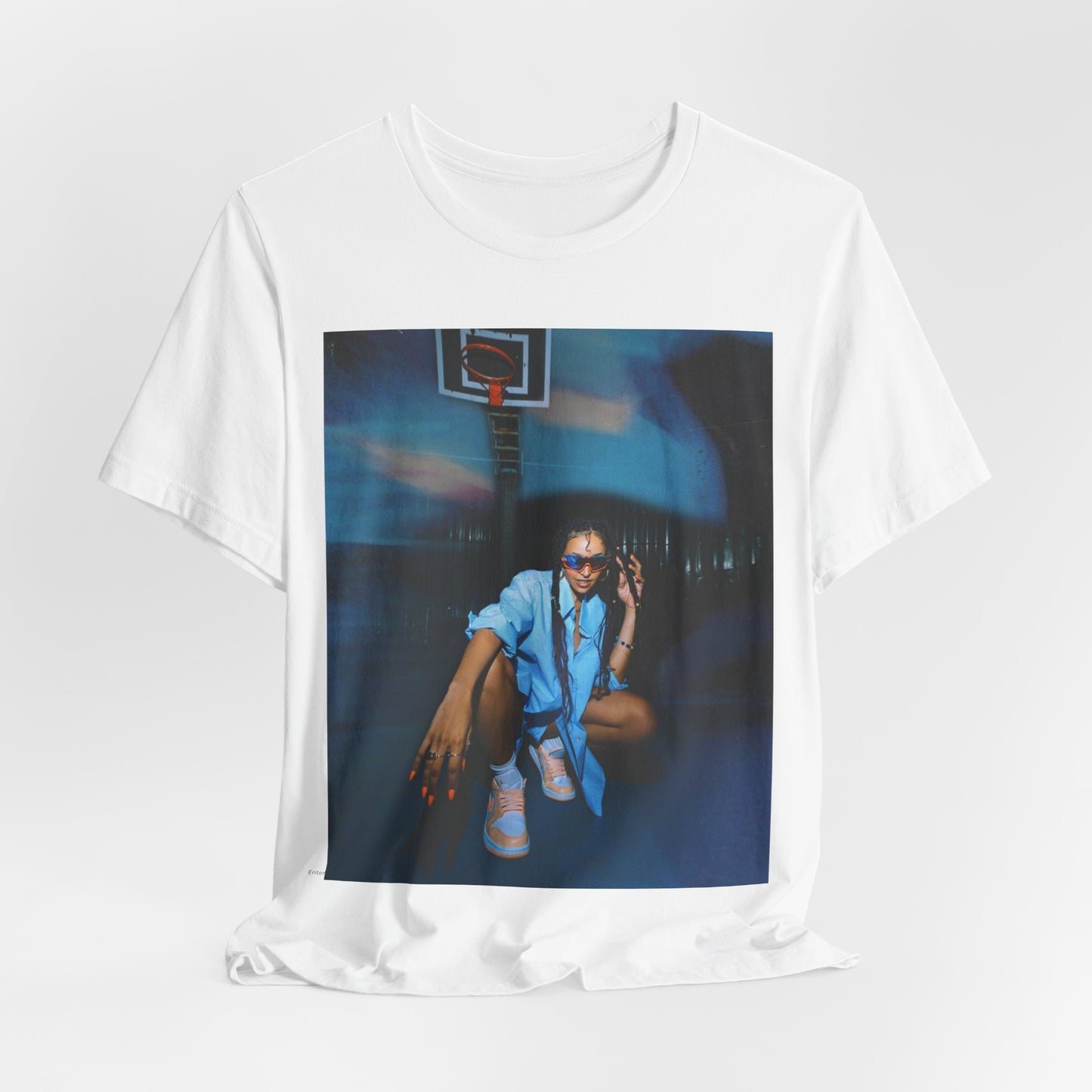 A black graphic t-shirt featuring an indie R&B streetwear graphic of Tinashe.