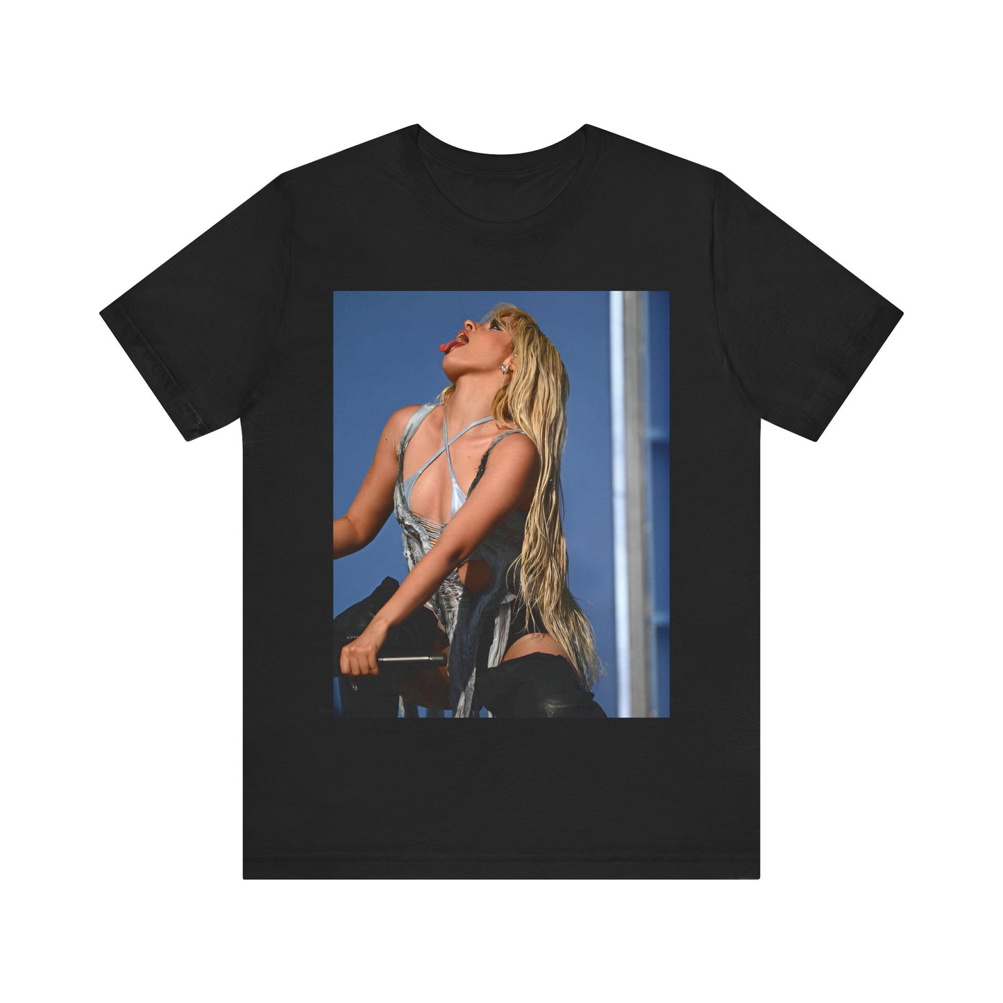 A black graphic t-shirt featuring a dynamic graphic or photo of Camila Cabello performing live on stage.