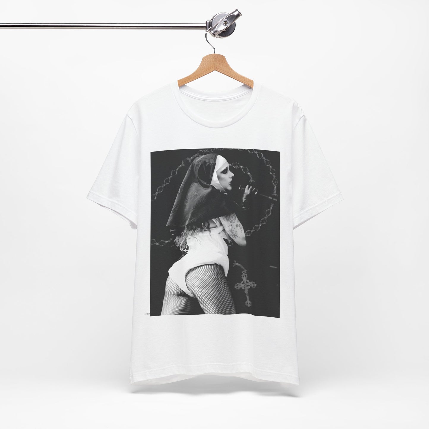 A black graphic t-shirt featuring a retro glam-style graphic of Chappell Roan dressed as a nun.