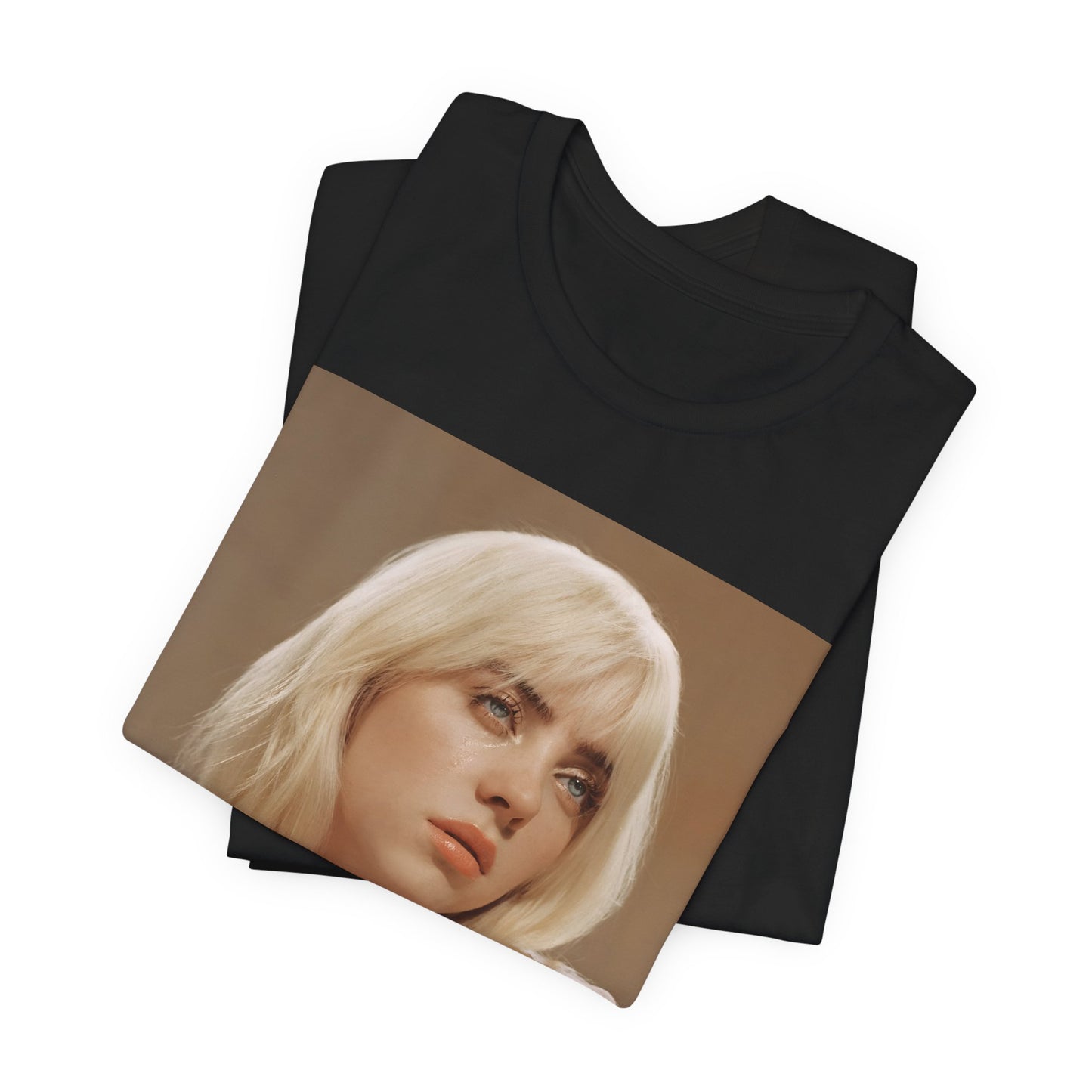 The iconic visual of Billie Eilish with black tears streaming down her face from the 'when the party's over' music video, printed on a t-shirt.