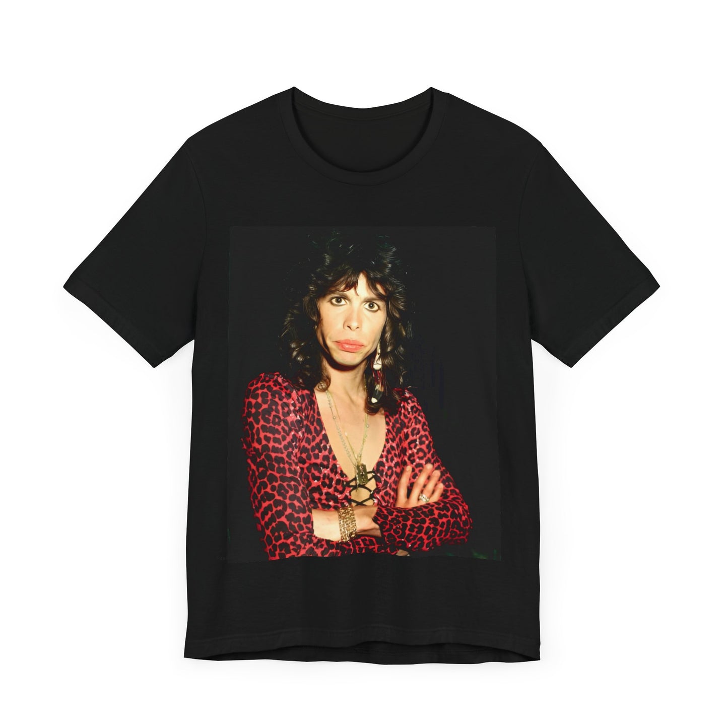 A black graphic t-shirt featuring a vintage 70s-inspired design with Aerosmith branding, incorporating a prominent leopard print pattern.