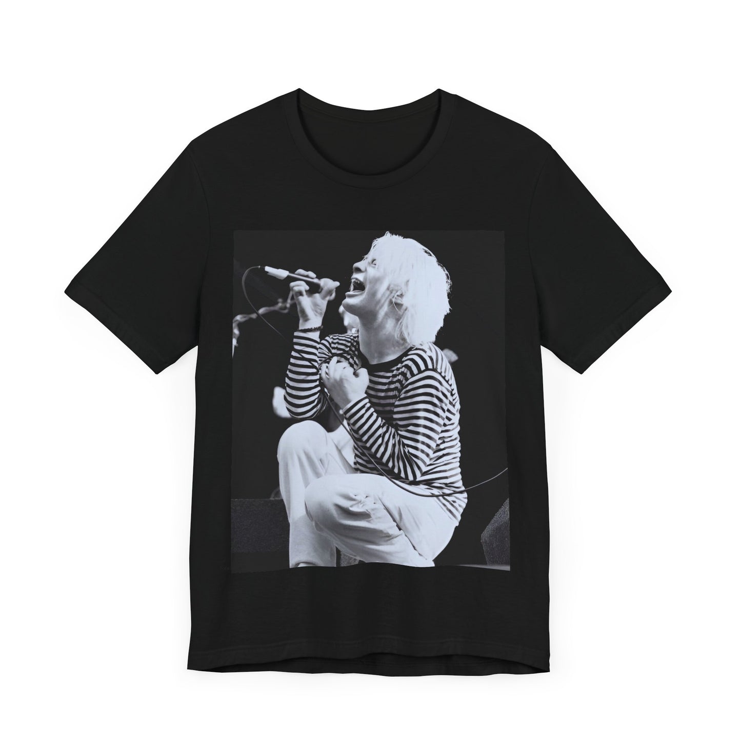 A black graphic t-shirt featuring a black and white graphic or photo of Radiohead performing live.