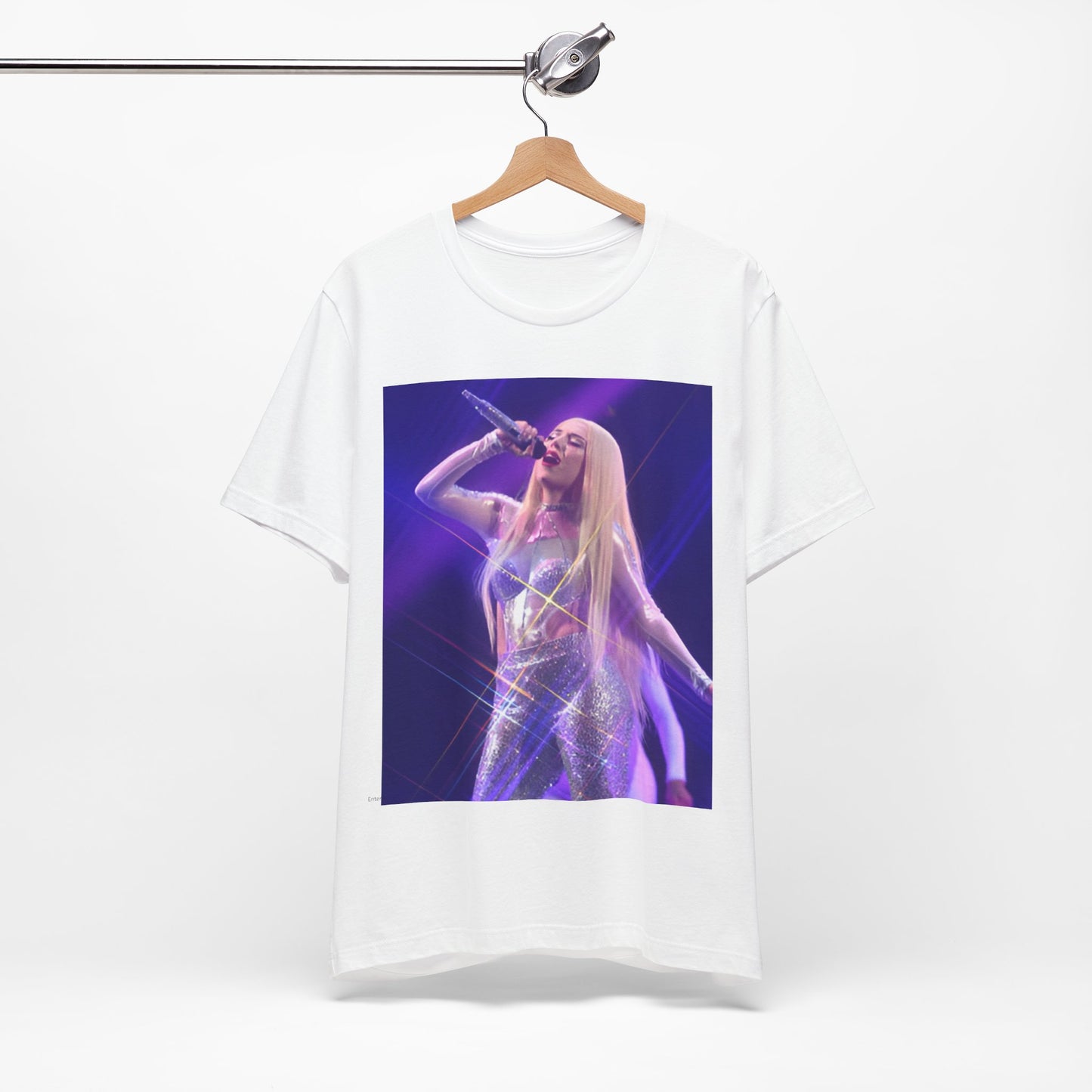 A black graphic t-shirt featuring a photo or illustration of Ava Max performing on stage, with a glittering or sparkling effect.