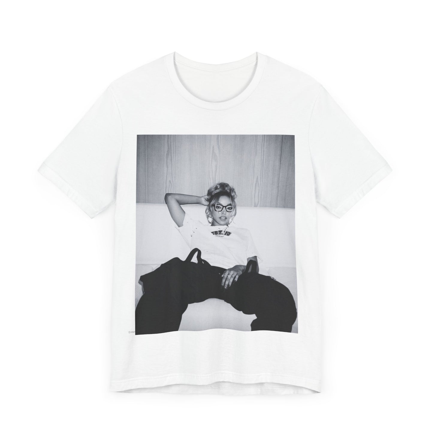 A black graphic t-shirt featuring a black and white portrait photo of Tinashe.