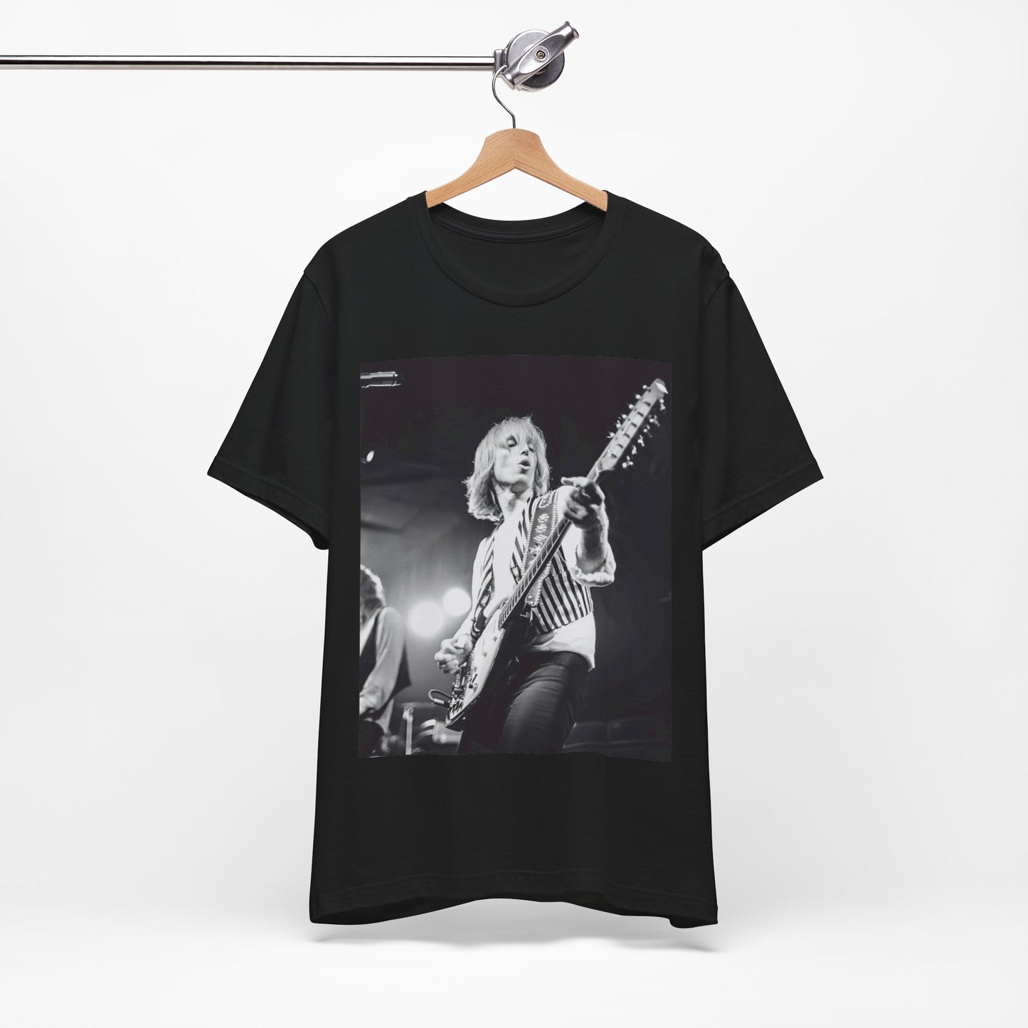 A black graphic t-shirt featuring a graphic of Tom Petty as a Rock & Roll Hall of Fame icon.