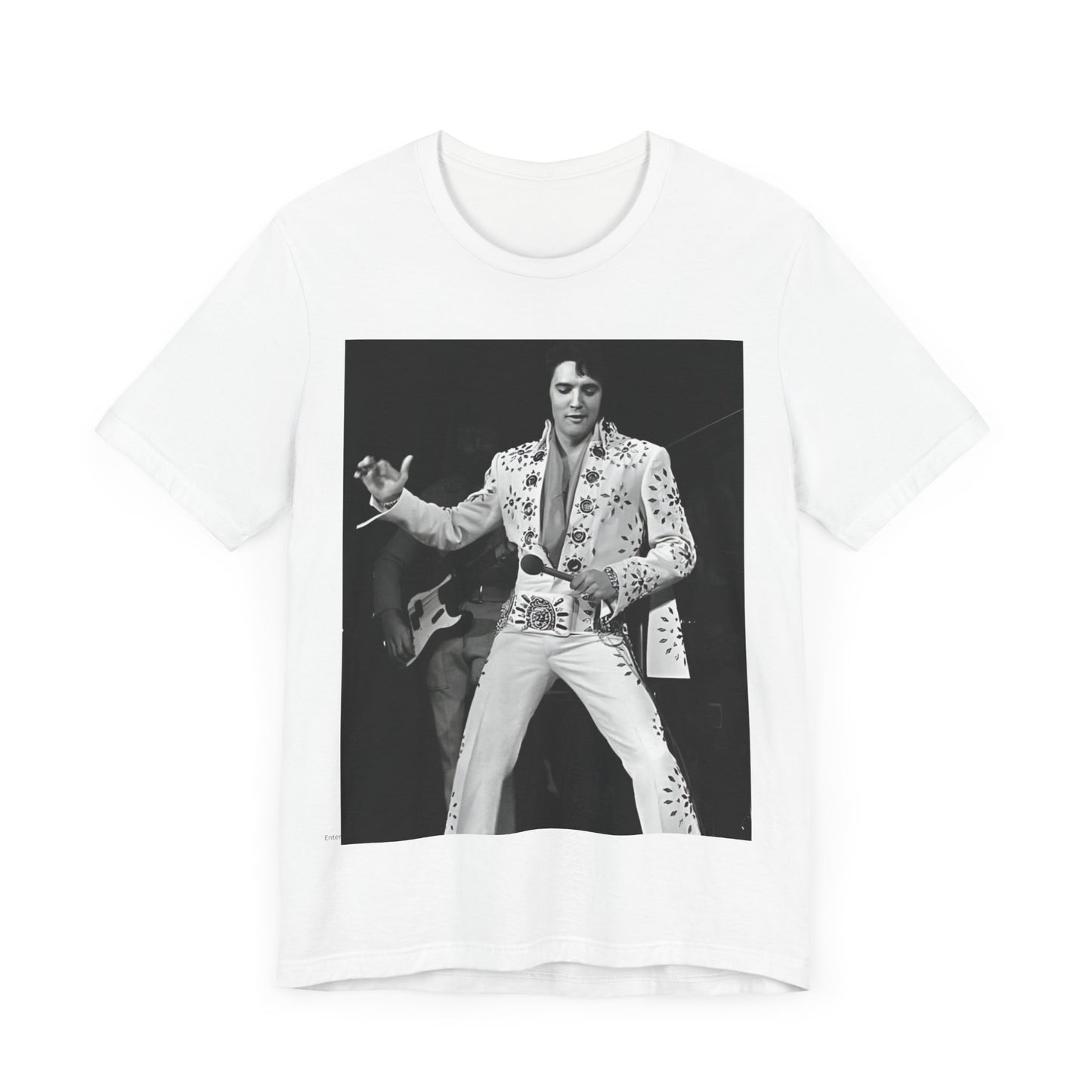 A black graphic t-shirt featuring a stylized graphic of Elvis Presley as The King of Rock 'n' Roll.