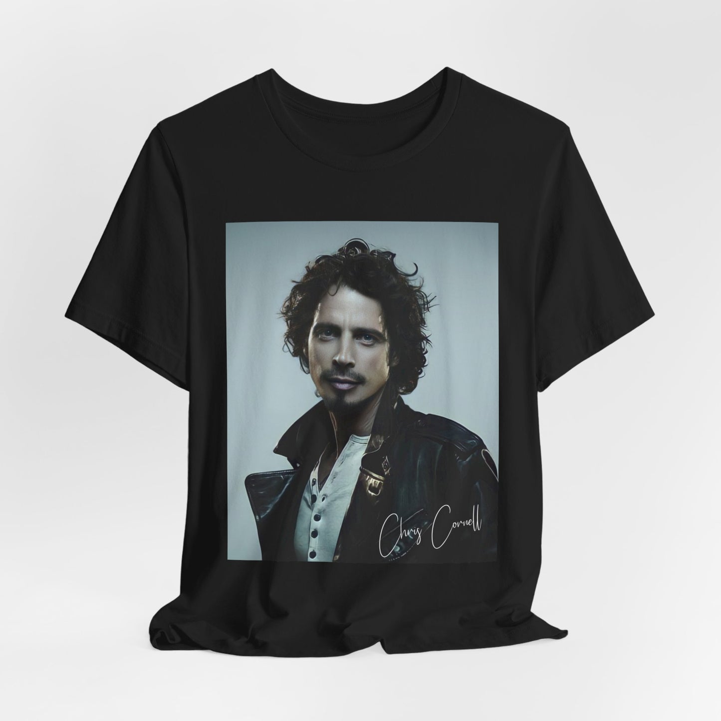 A black graphic t-shirt featuring a graphic related to Chris Cornell's song 'Like a Stone'.