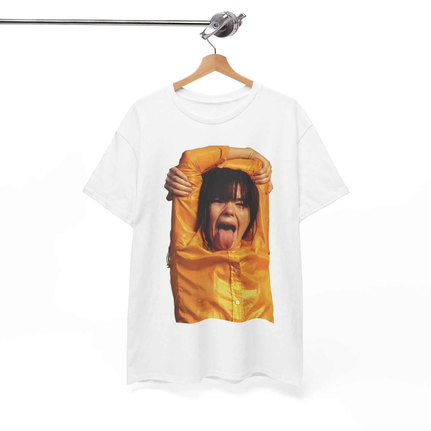 A black graphic t-shirt featuring a photo of Bjork with her tongue playfully sticking out.