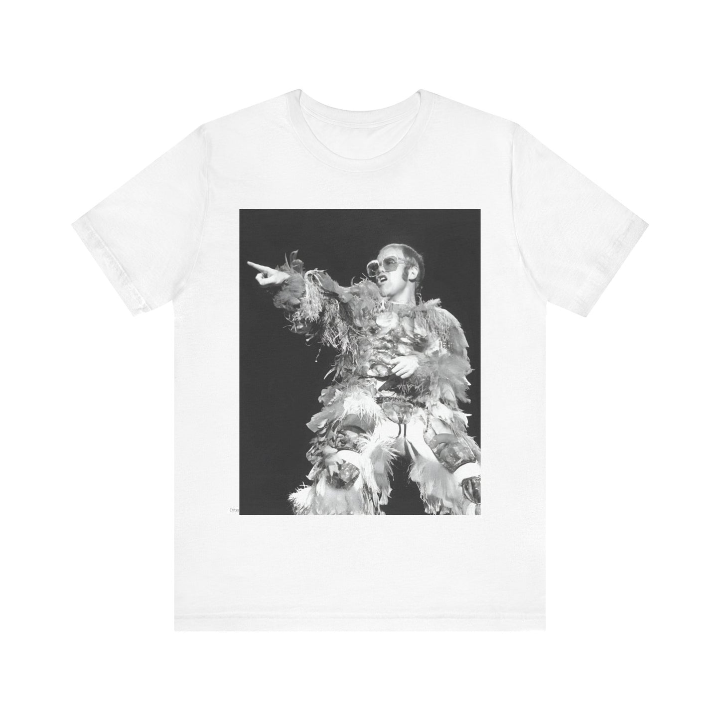 A black graphic t-shirt featuring a retro graphic of Elton John as a rock legend performing live.