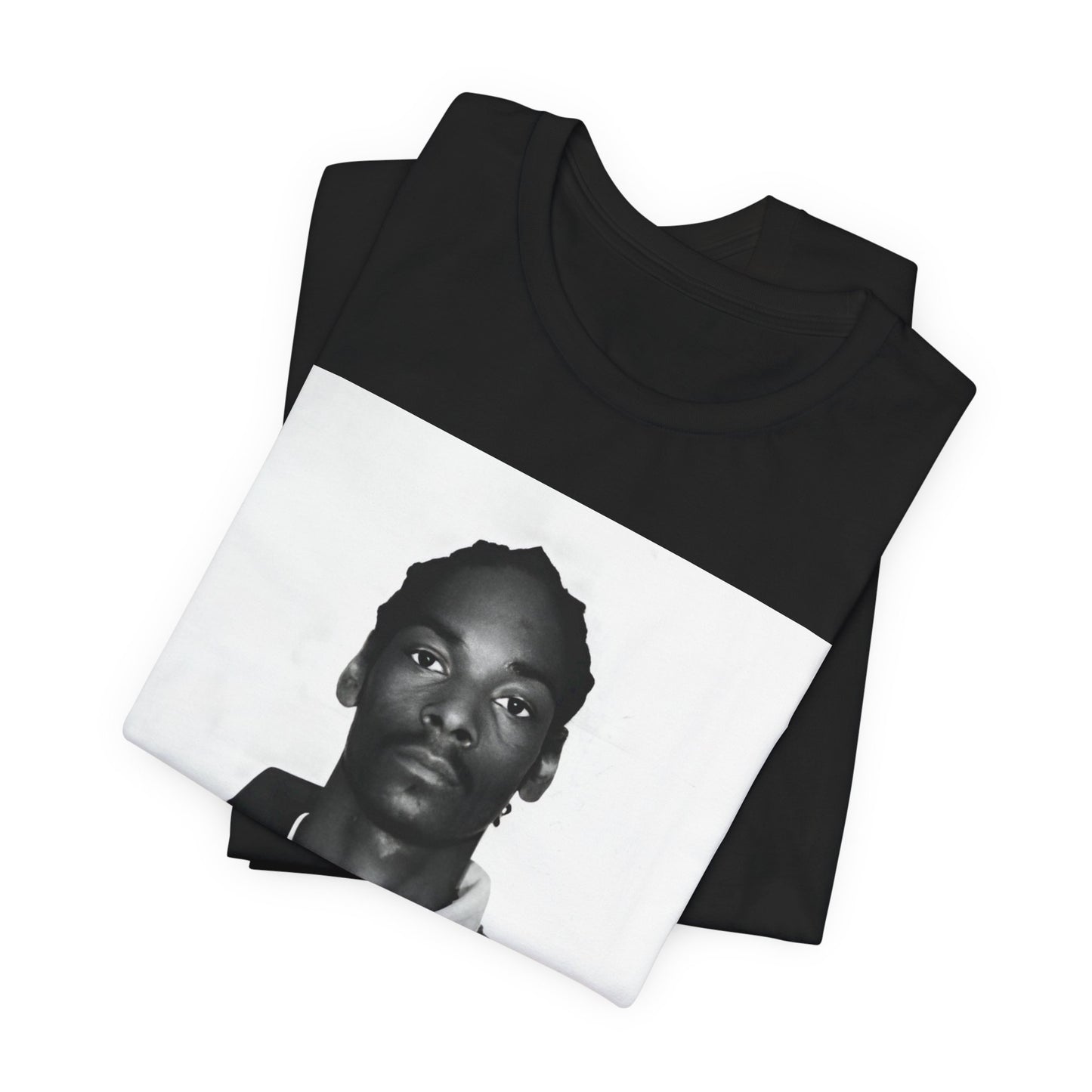 A black graphic t-shirt featuring a graphic of Snoop Dogg's mug shot.