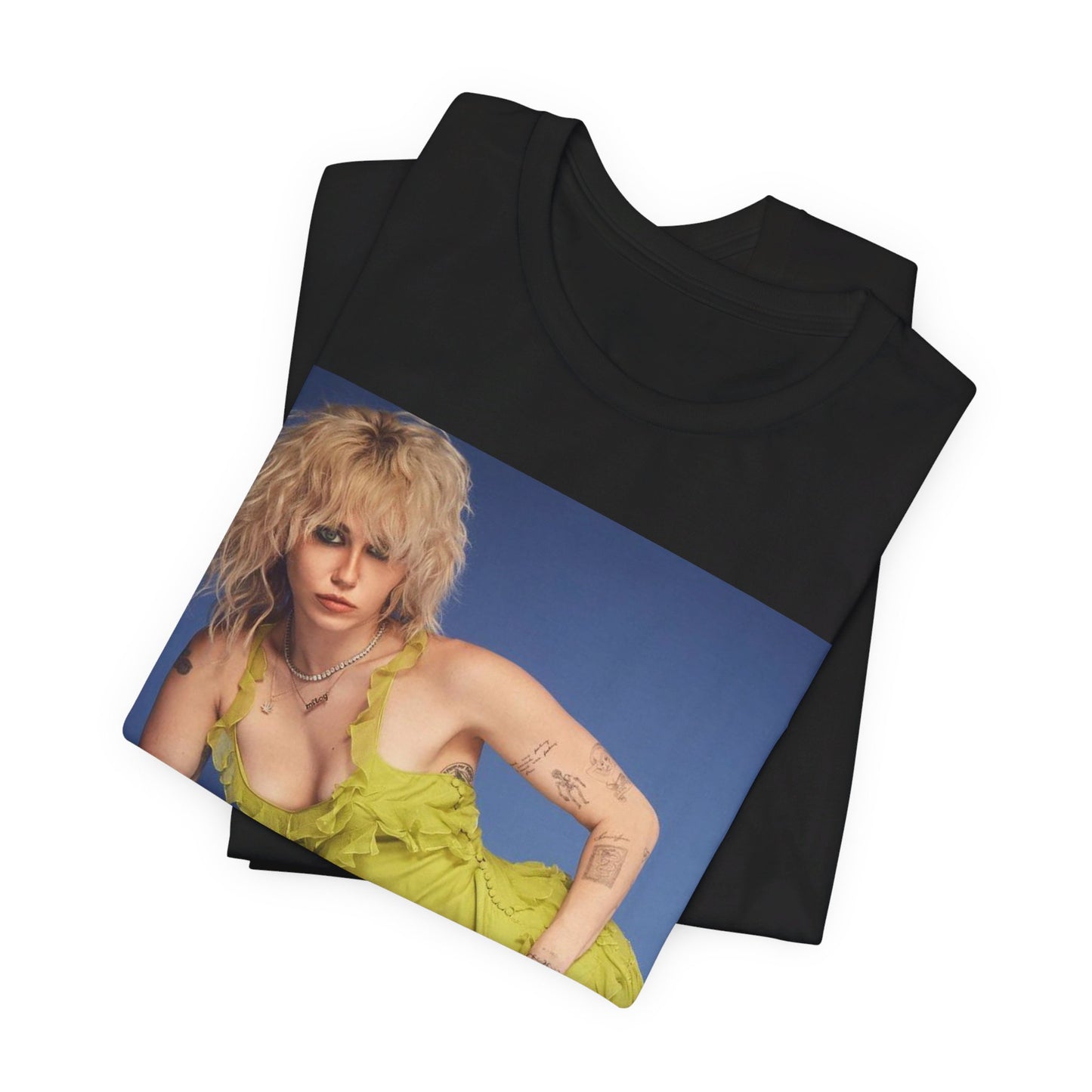 A black graphic t-shirt featuring a graphic of Miley Cyrus as a global pop phenomenon.