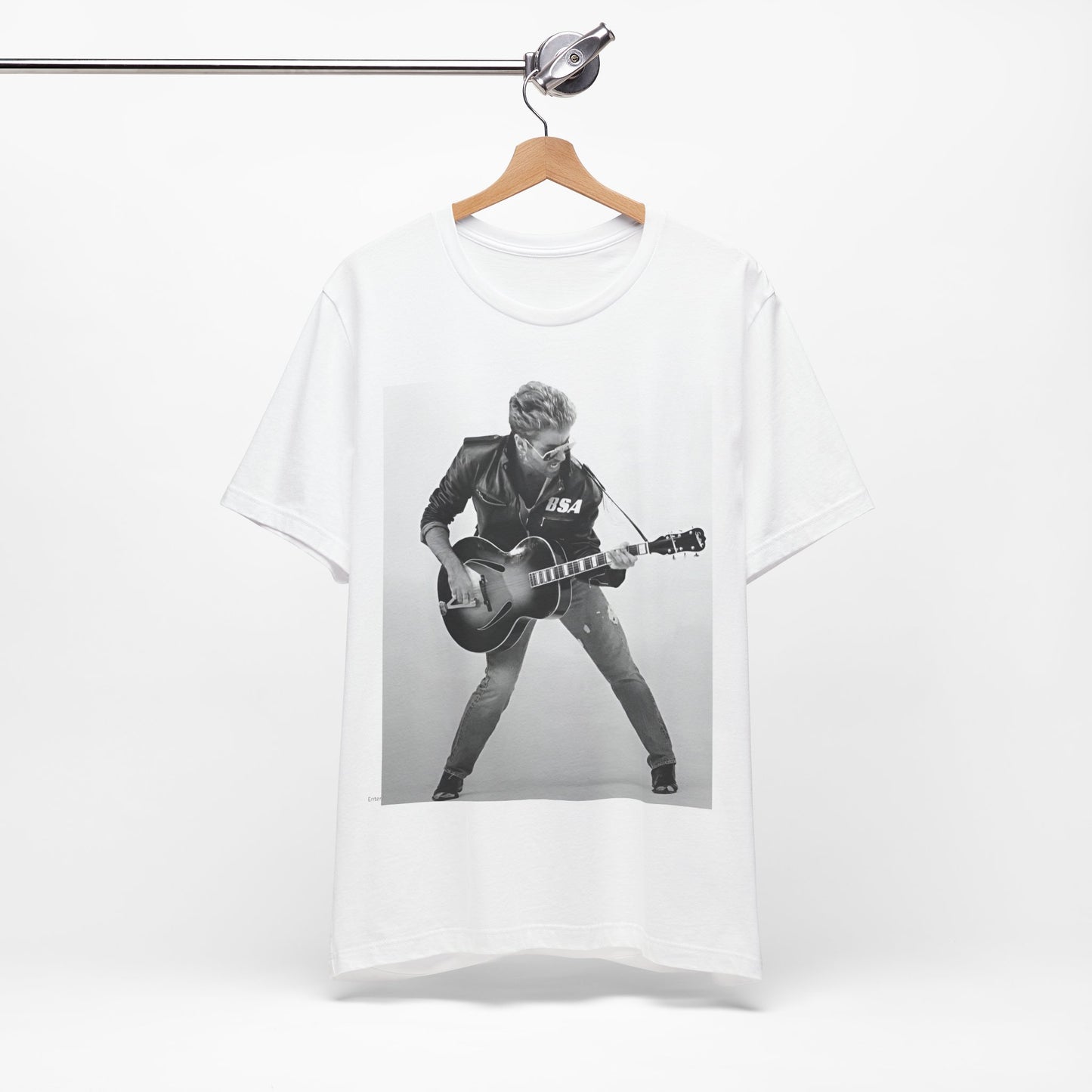A black graphic t-shirt featuring a graphic of George Michael with a guitar.
