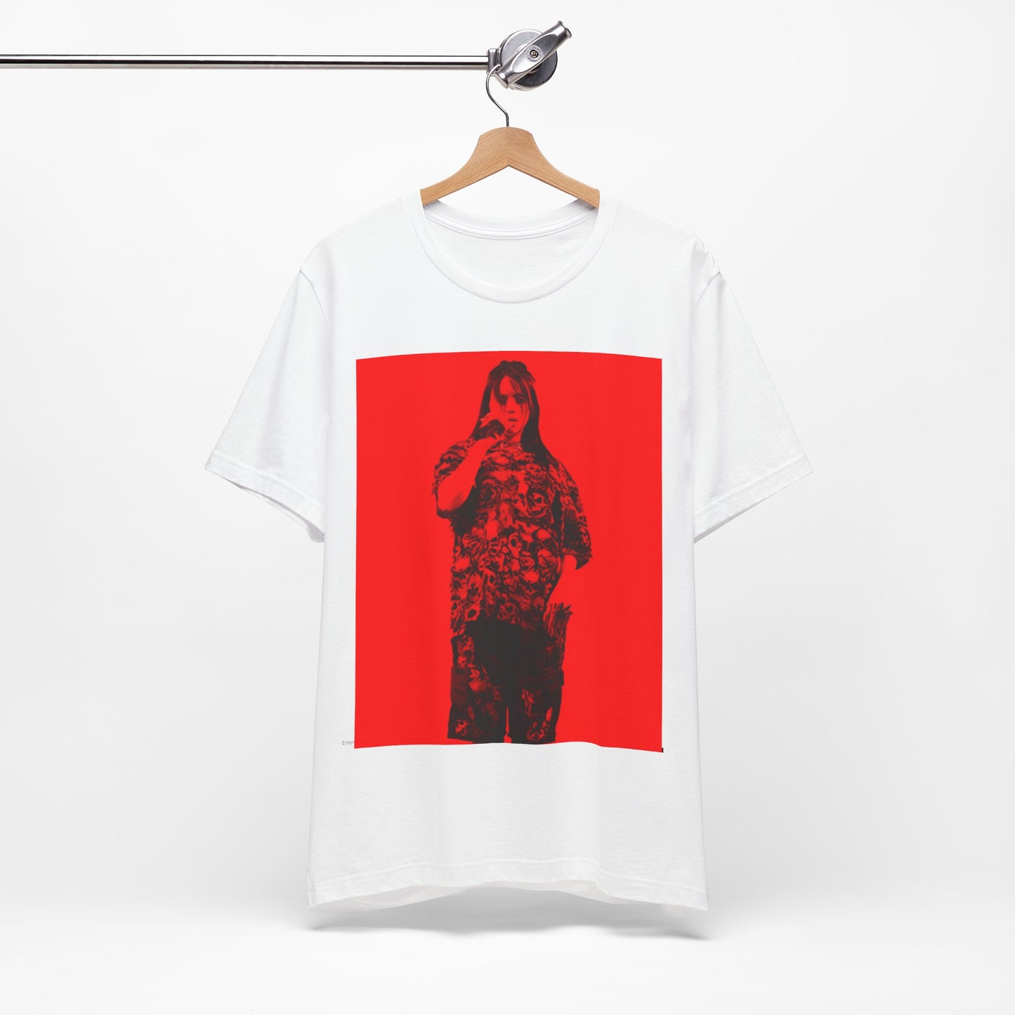 A portrait of Billie Eilish with platinum blonde hair from her 'Happier Than Ever' era, looking over her shoulder, printed on a graphic t-shirt.