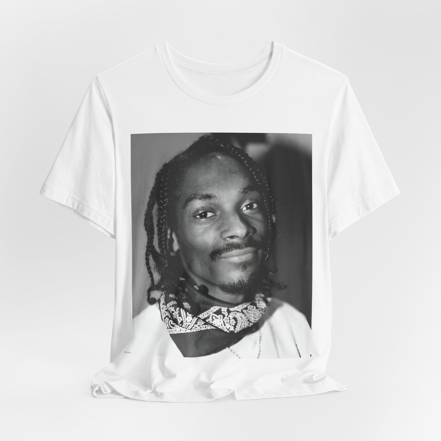 A black graphic t-shirt featuring a modern rap essential graphic of Snoop Dogg.