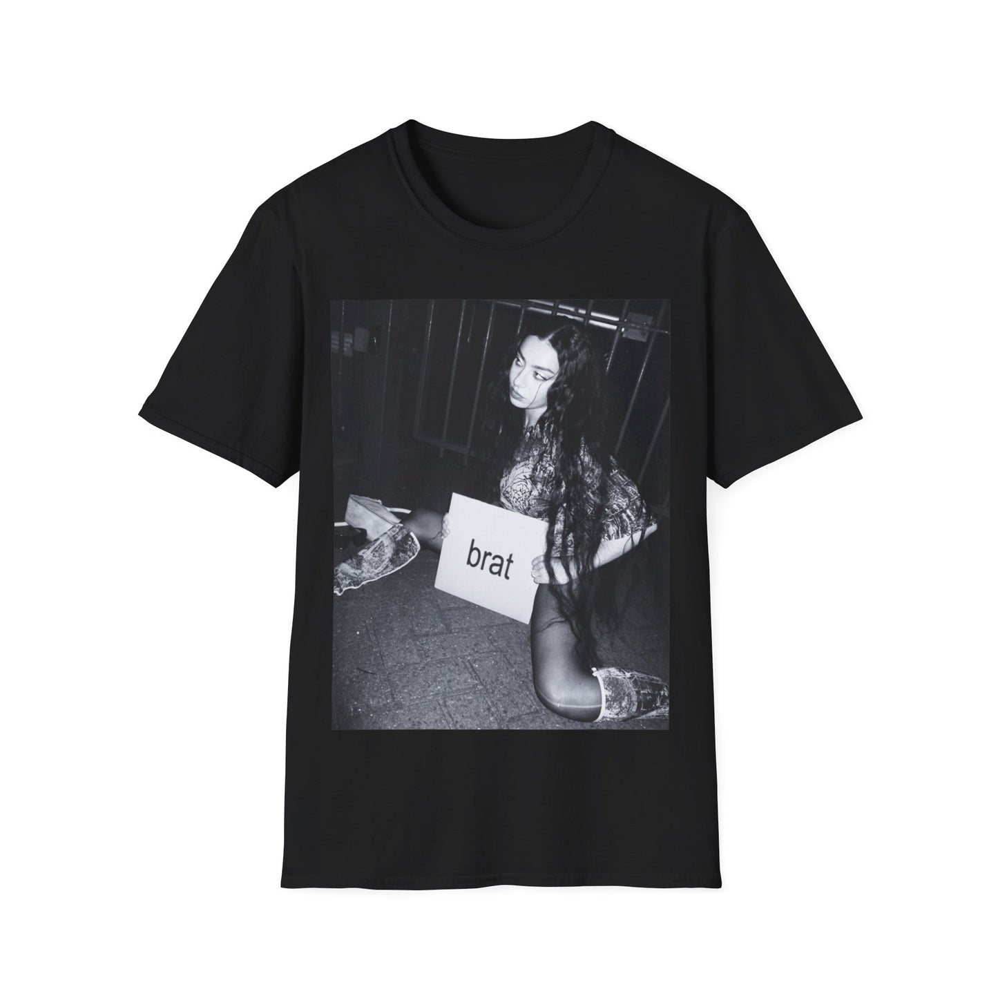 A black graphic t-shirt featuring a graphic related to Charli XCX's 'Brat' album.