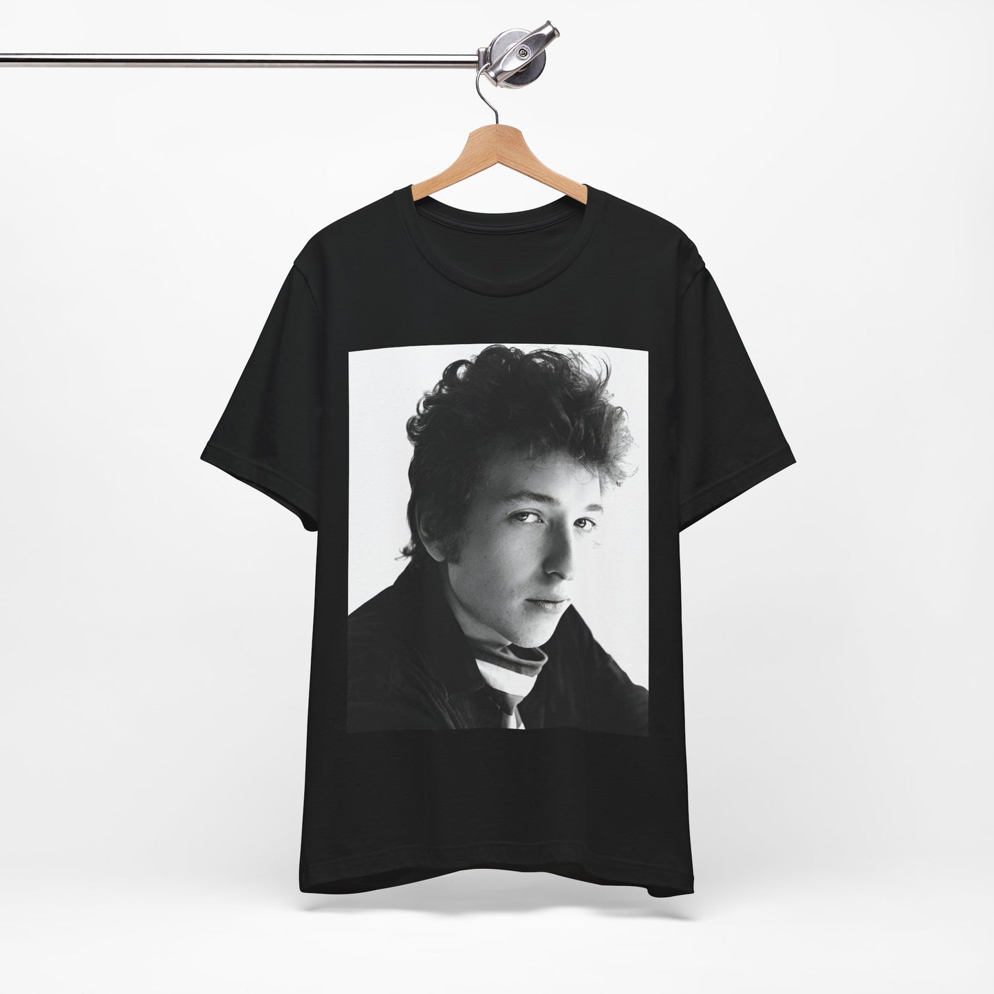 A black graphic t-shirt featuring a graphic related to Bob Dylan's 'Like a Rolling Stone' song or era.