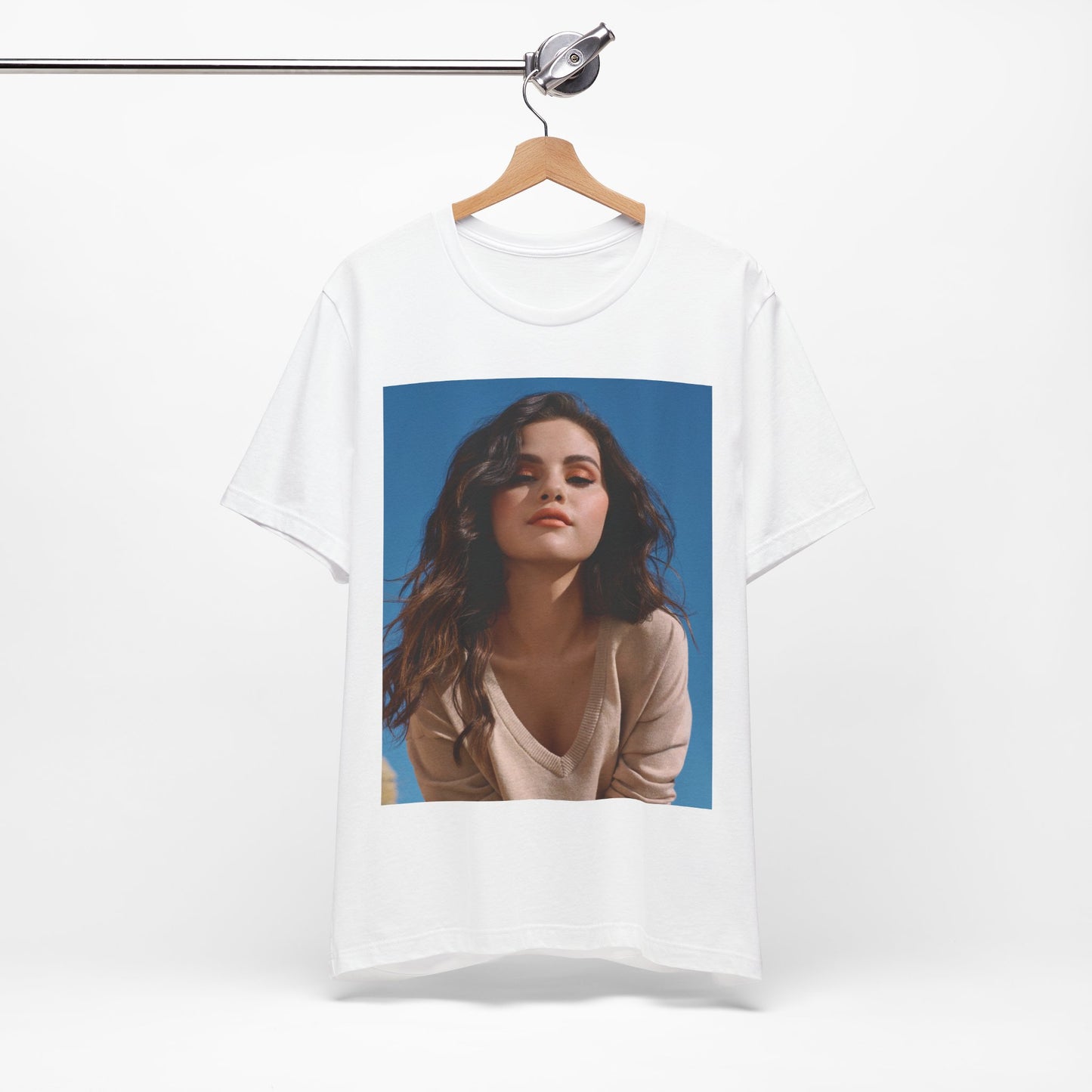 A black graphic t-shirt featuring a vintage pop icon graphic of Selena Gomez.