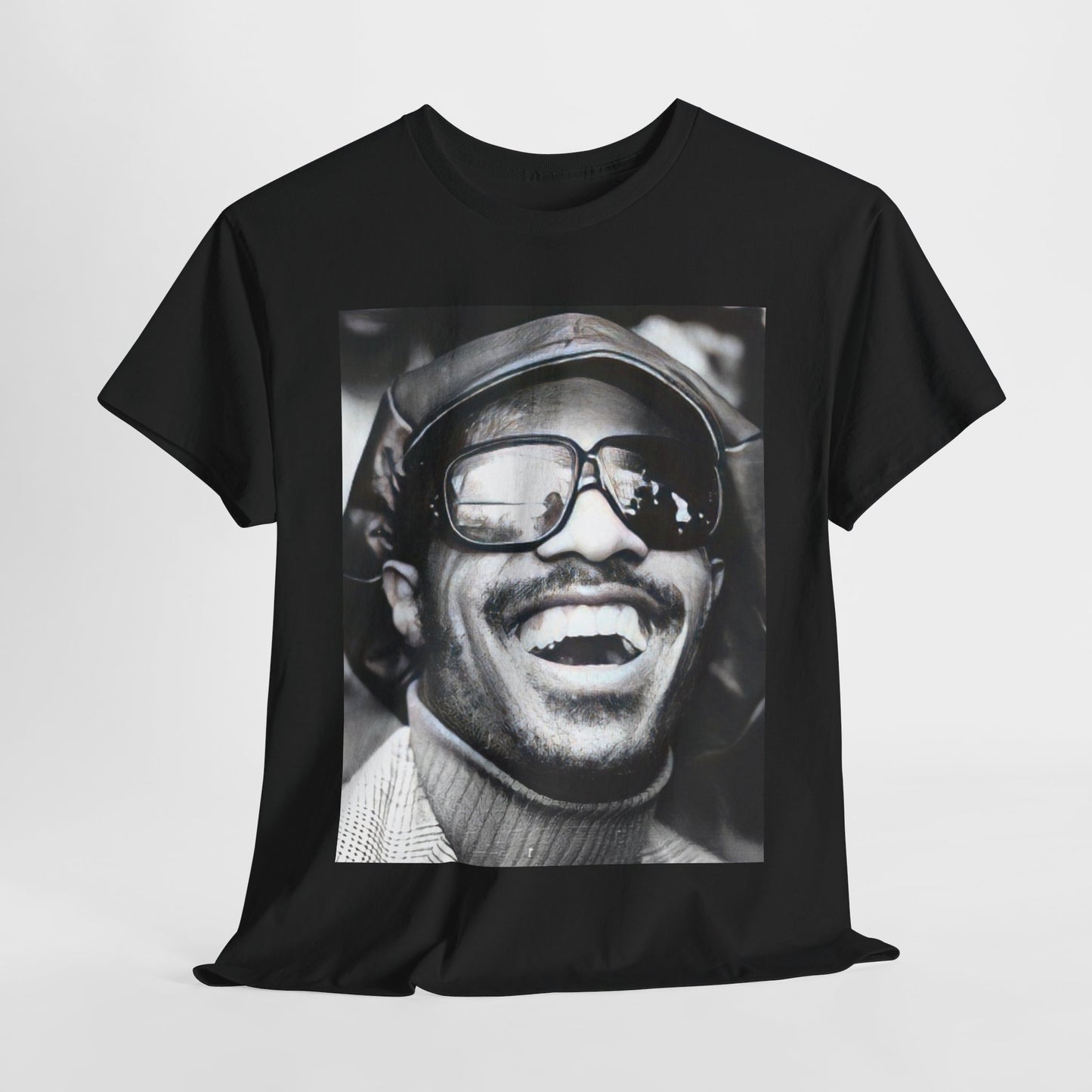 A black graphic t-shirt featuring a black and white portrait photo of Stevie Wonder.